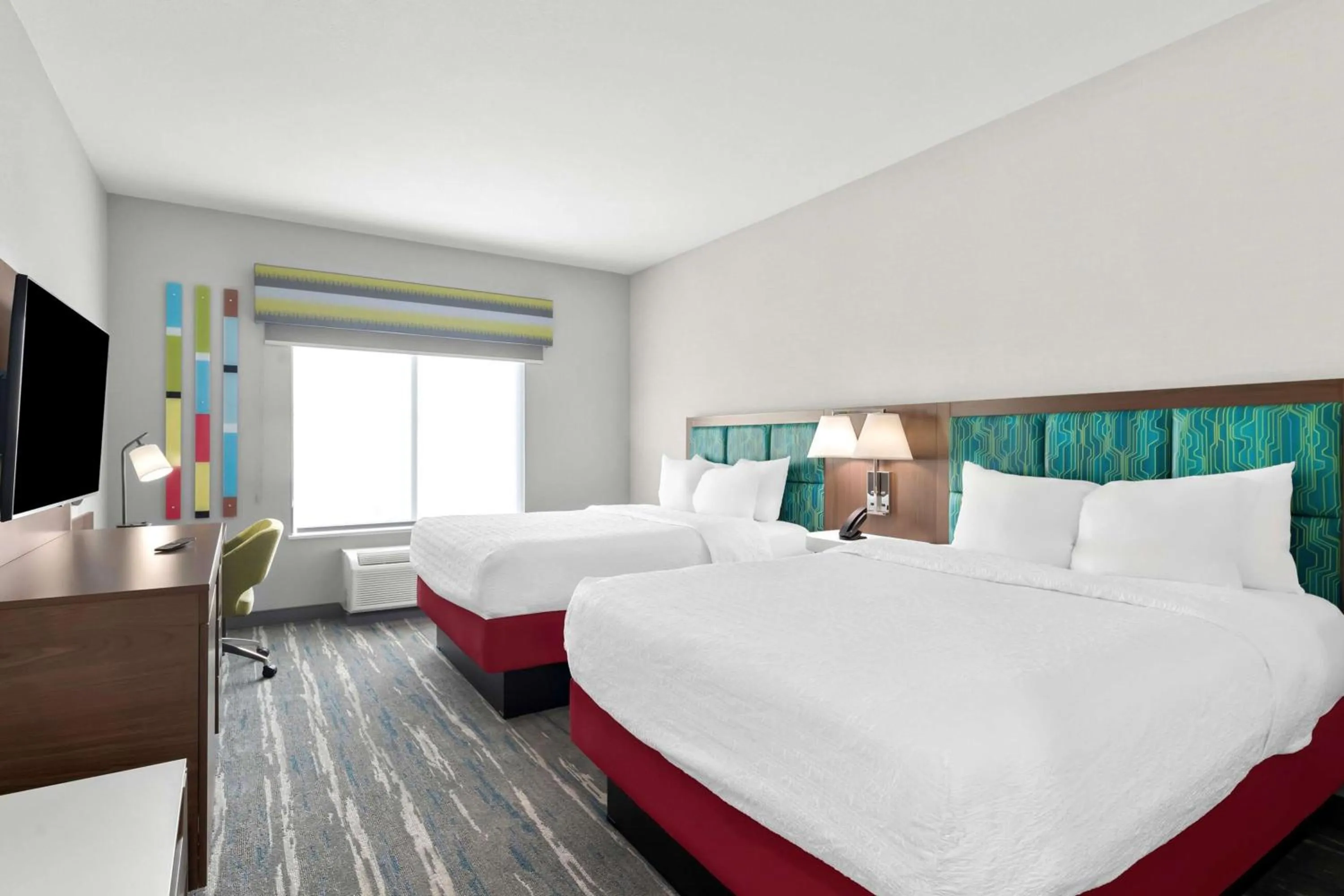 Bed in Hampton Inn & Suites Sherman