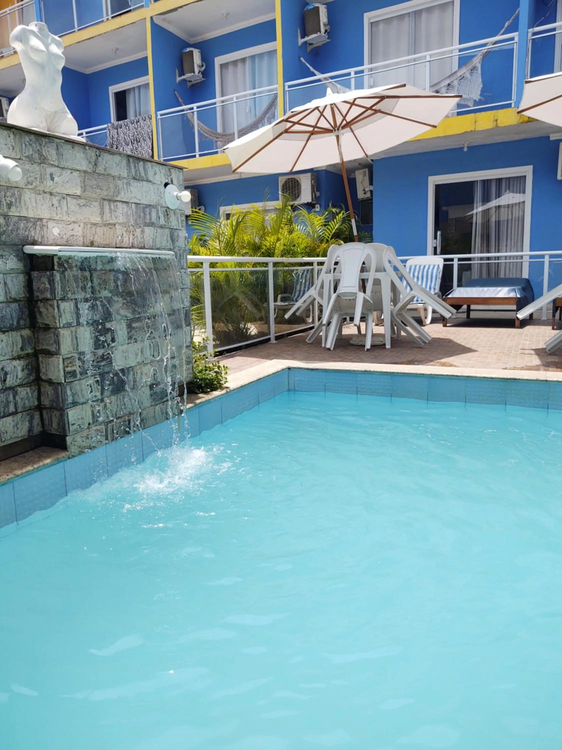 Swimming pool in Pousada Maresia Costa Azul