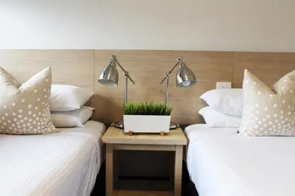 Bedroom, Bed in Crossroads Hotel Bedroom, Bed in Crossroads Hotel