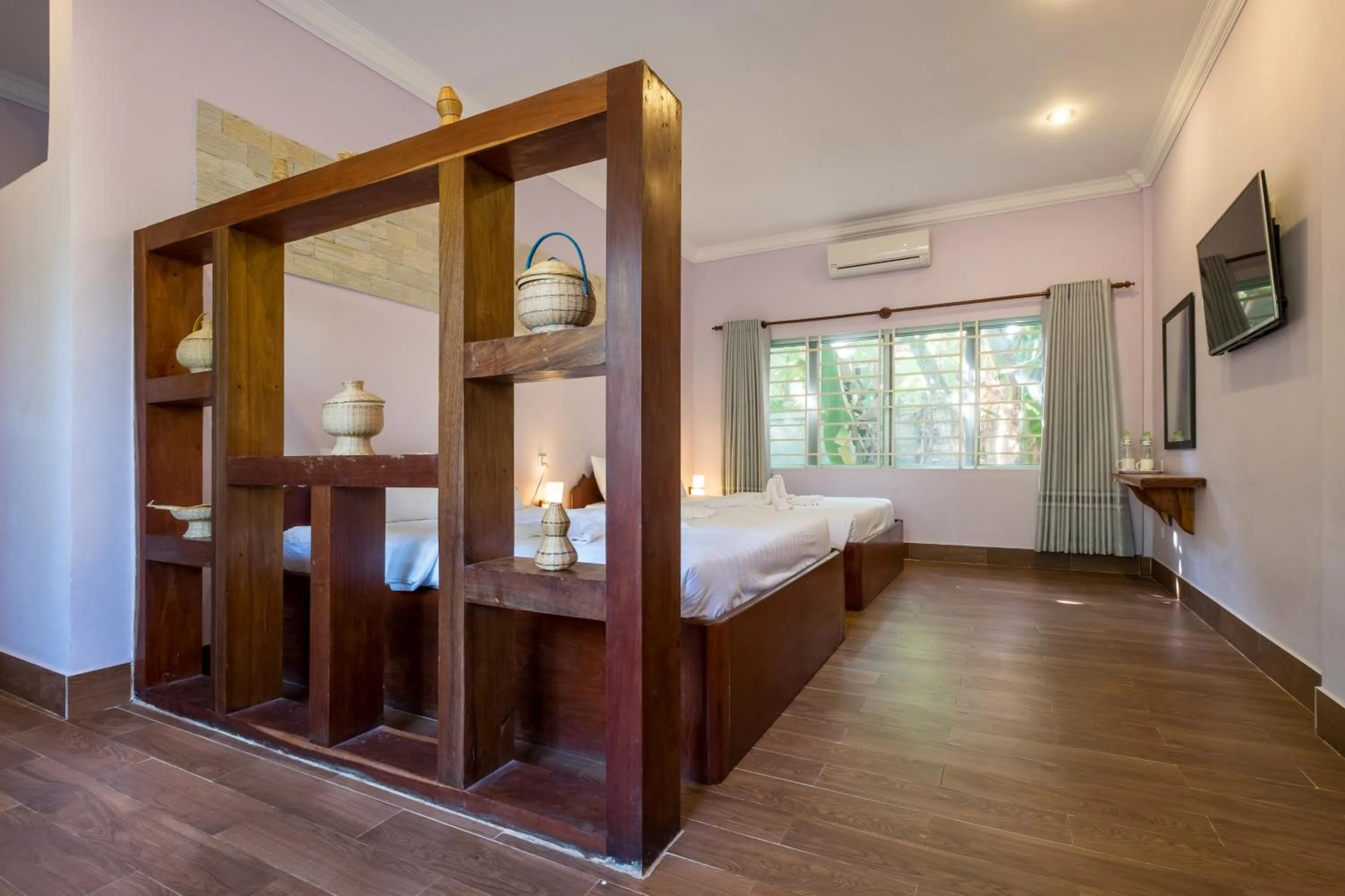 Bed in Kep Bungalows