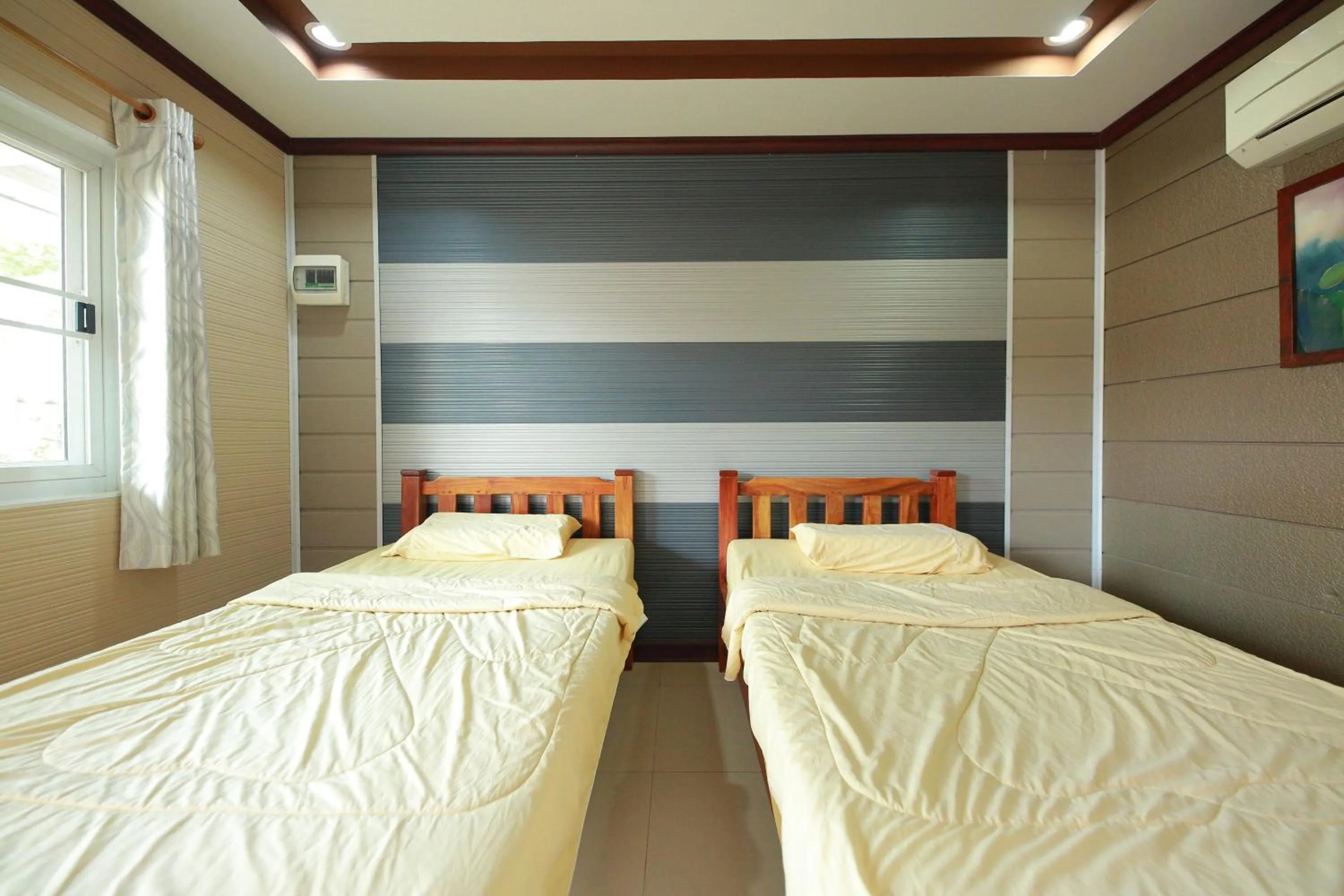 Bed in Baan Sabuy Jung