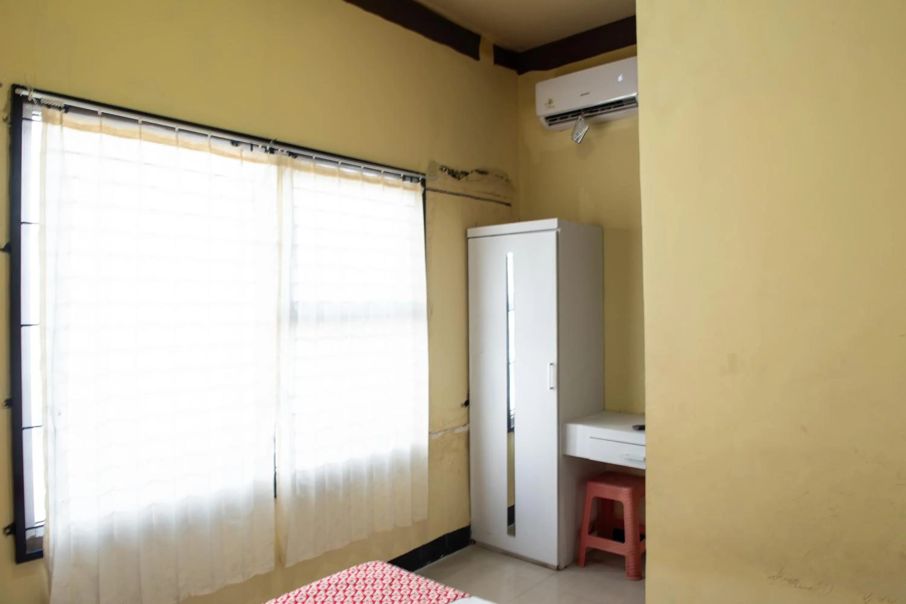 Bedroom in Hotel O Homestay Puspa Gemilang Syariah