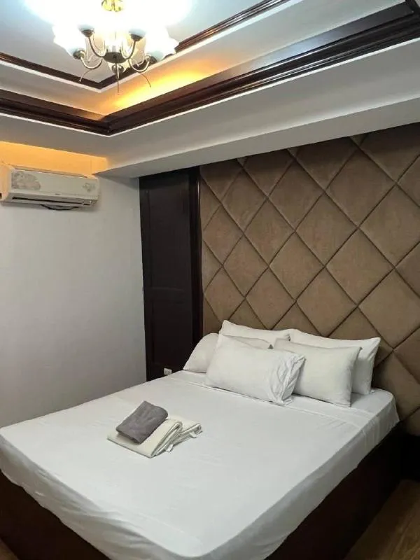 Bed in Kay Hotel and Residences