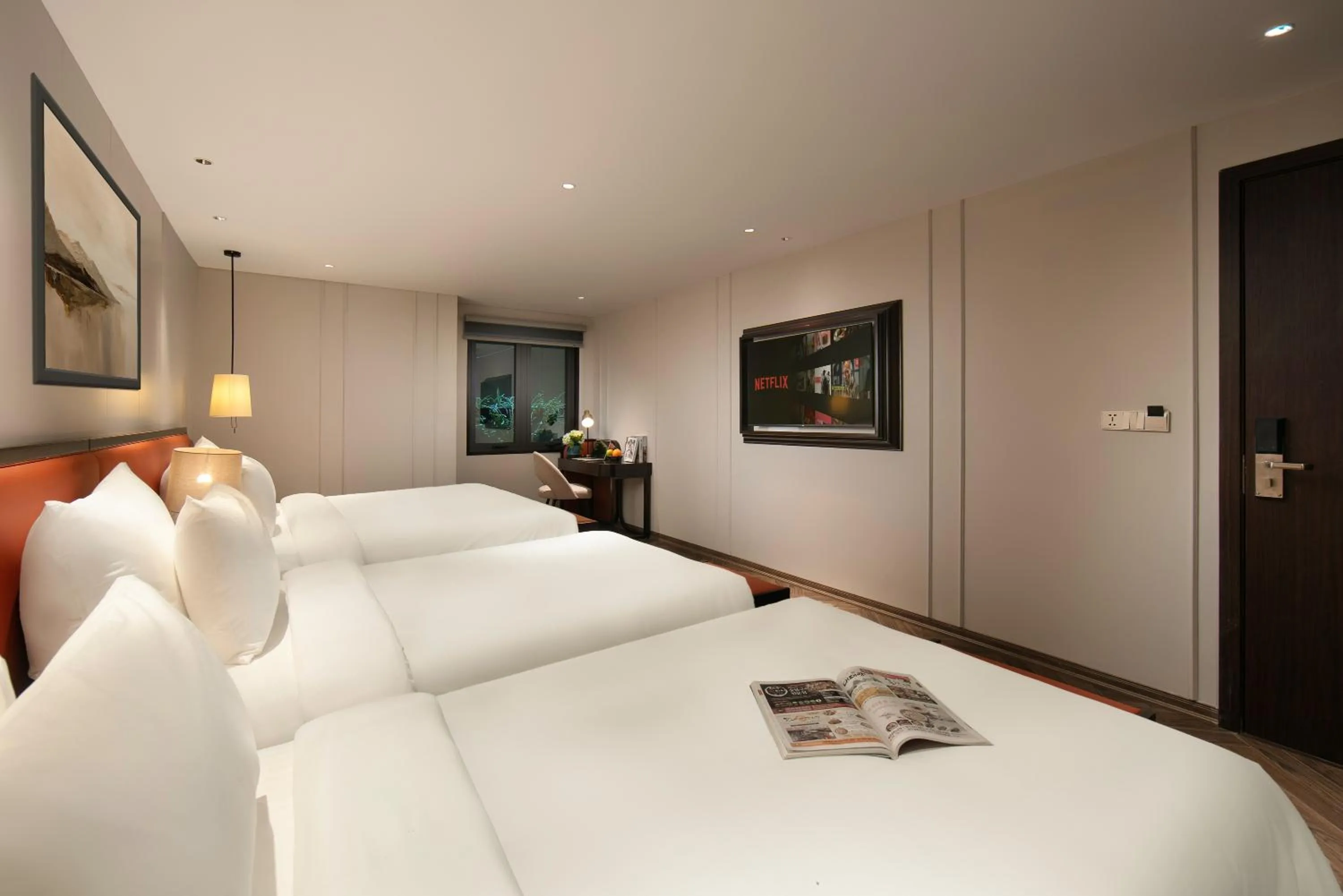 Bed in Le Premier Hotel & Rooftop Bar