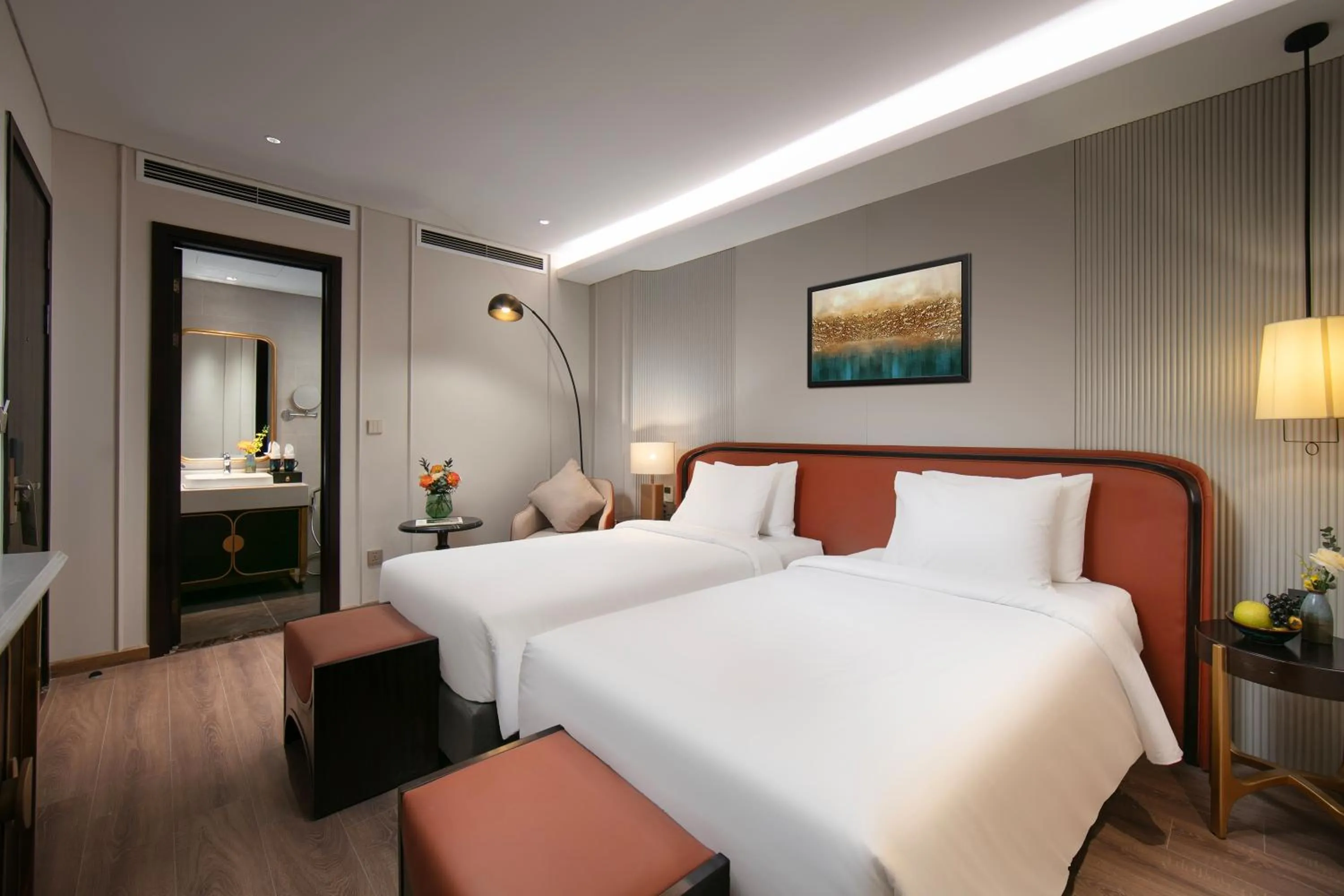 Bed in Le Premier Hotel & Rooftop Bar