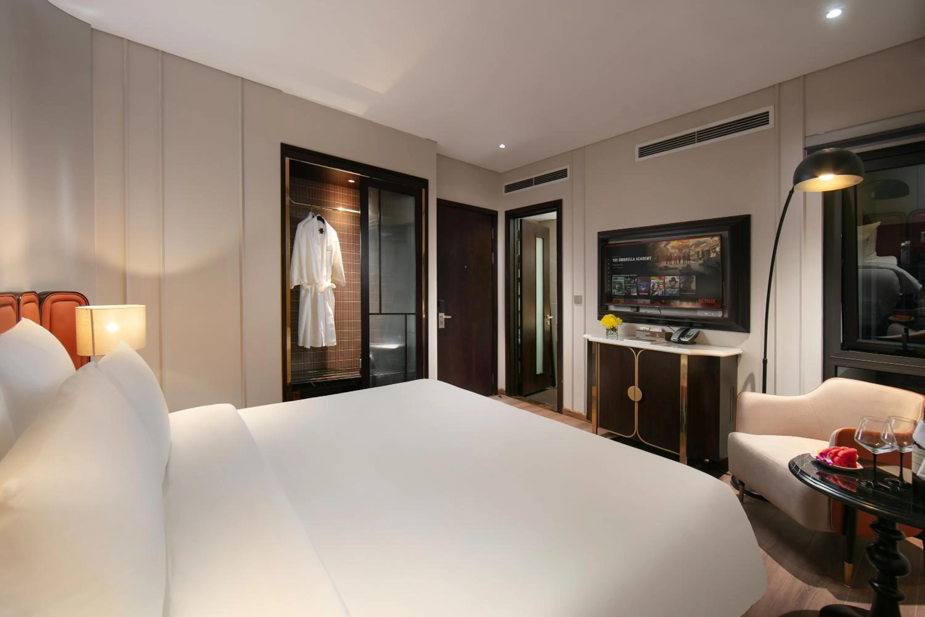 Bed in Le Premier Hotel & Rooftop Bar