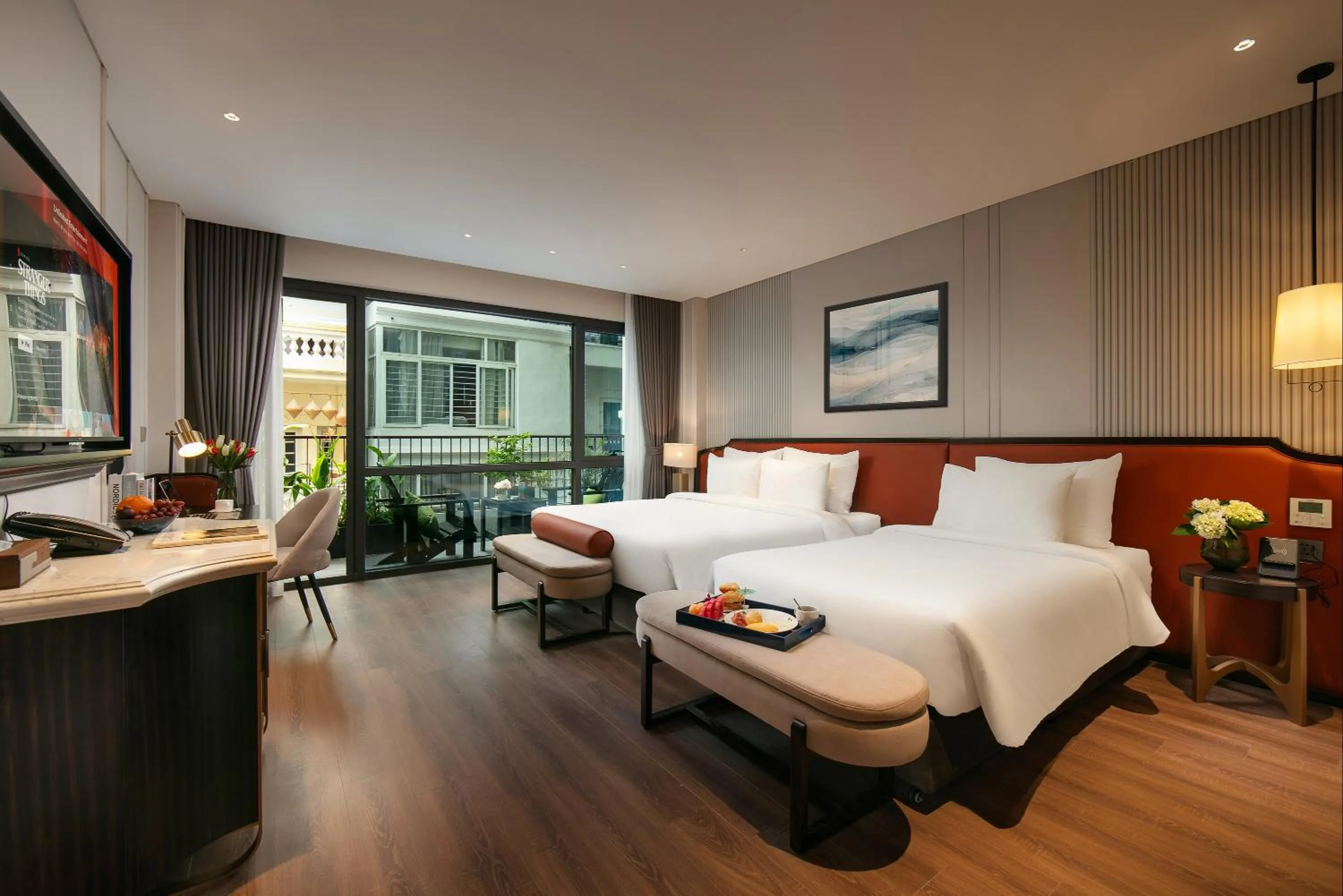 Bed in Le Premier Hotel & Rooftop Bar