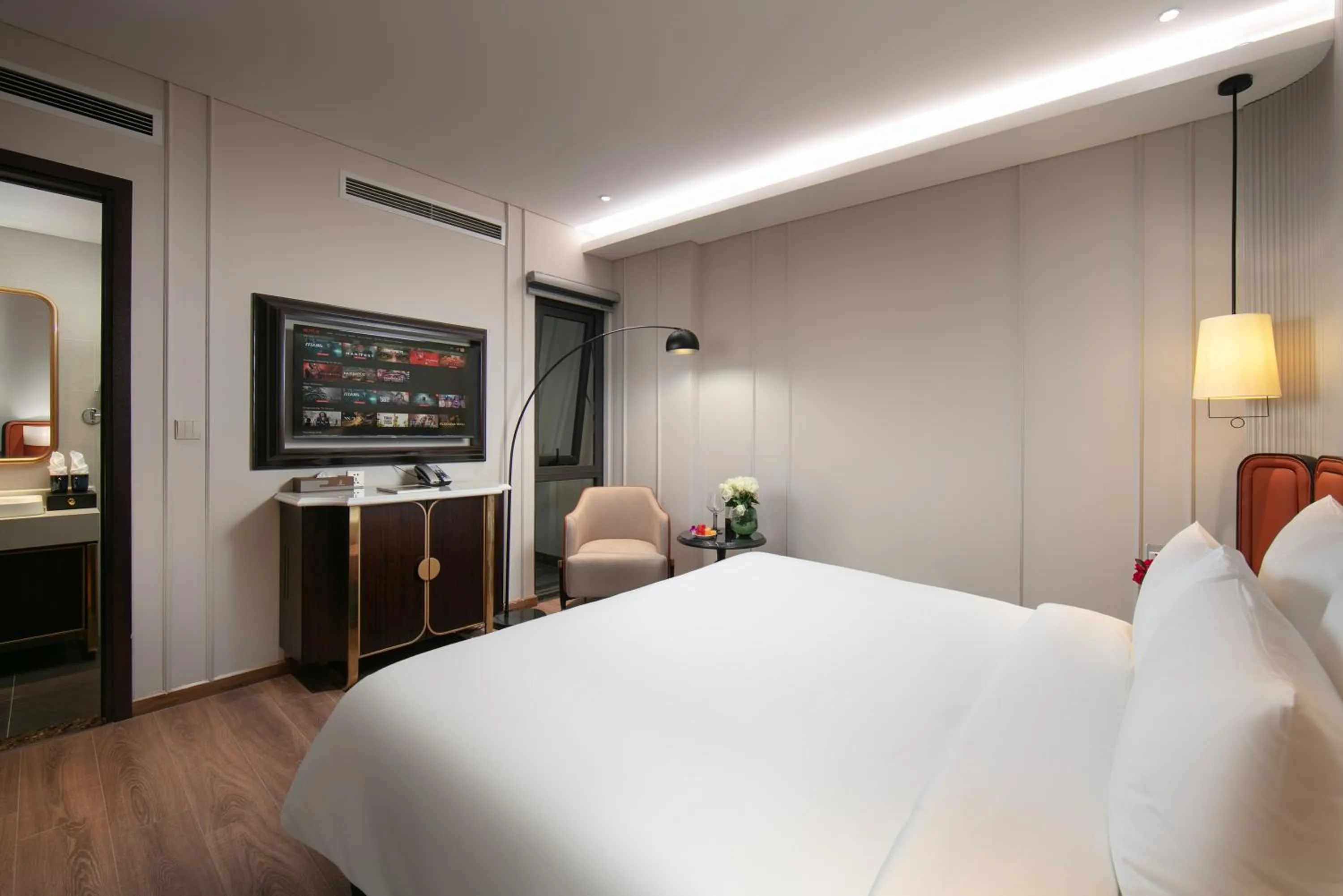 Bed in Le Premier Hotel & Rooftop Bar