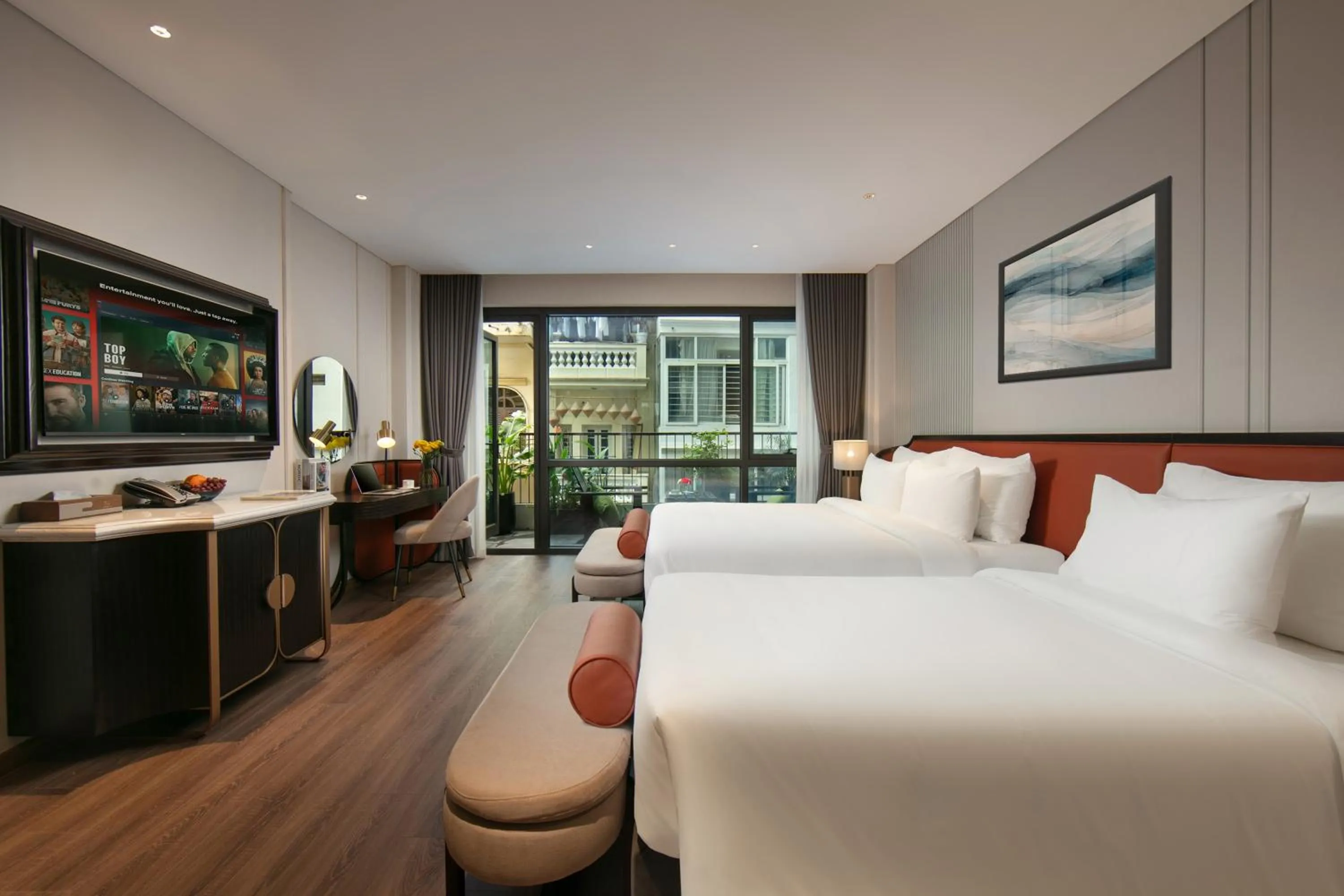 Bed in Le Premier Hotel & Rooftop Bar