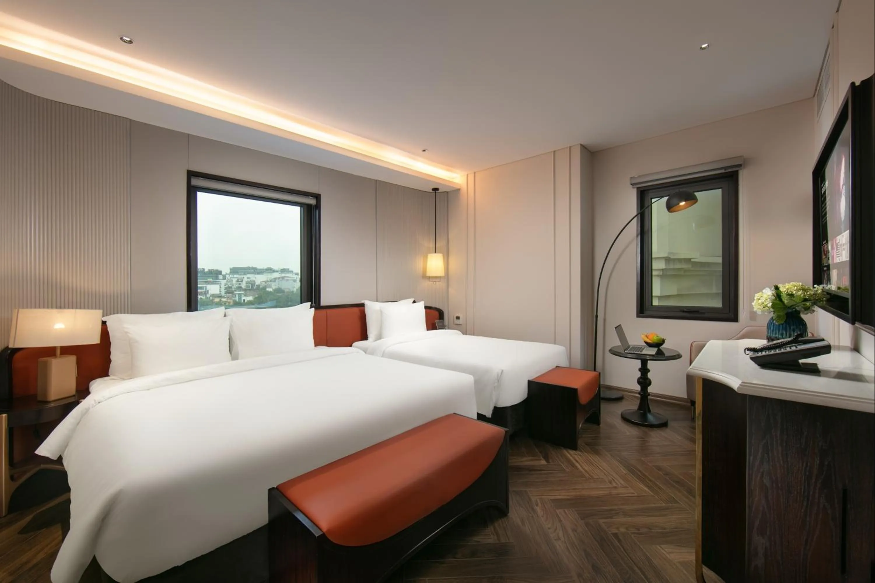Bed in Le Premier Hotel & Rooftop Bar