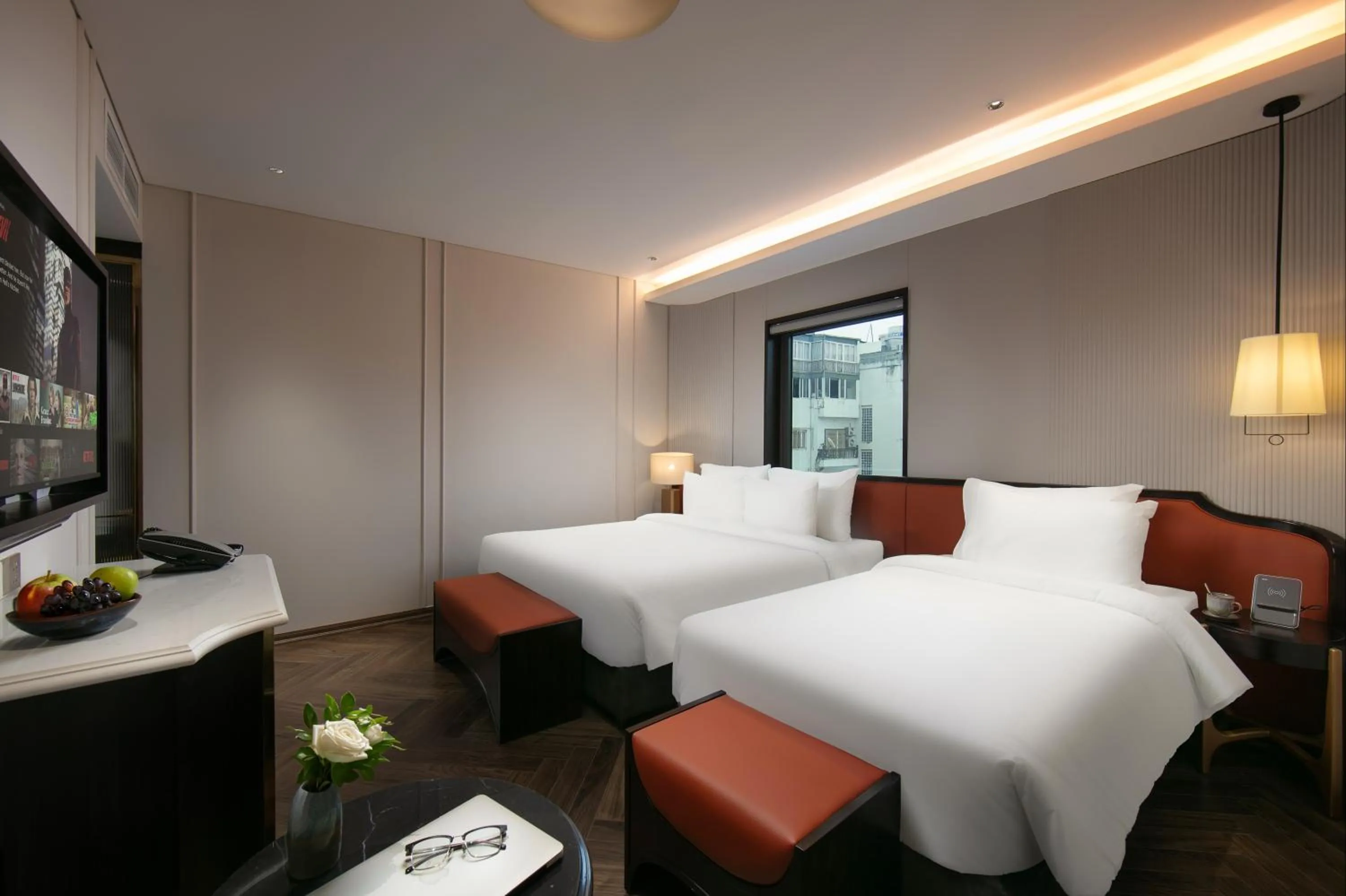 Bed in Le Premier Hotel & Rooftop Bar