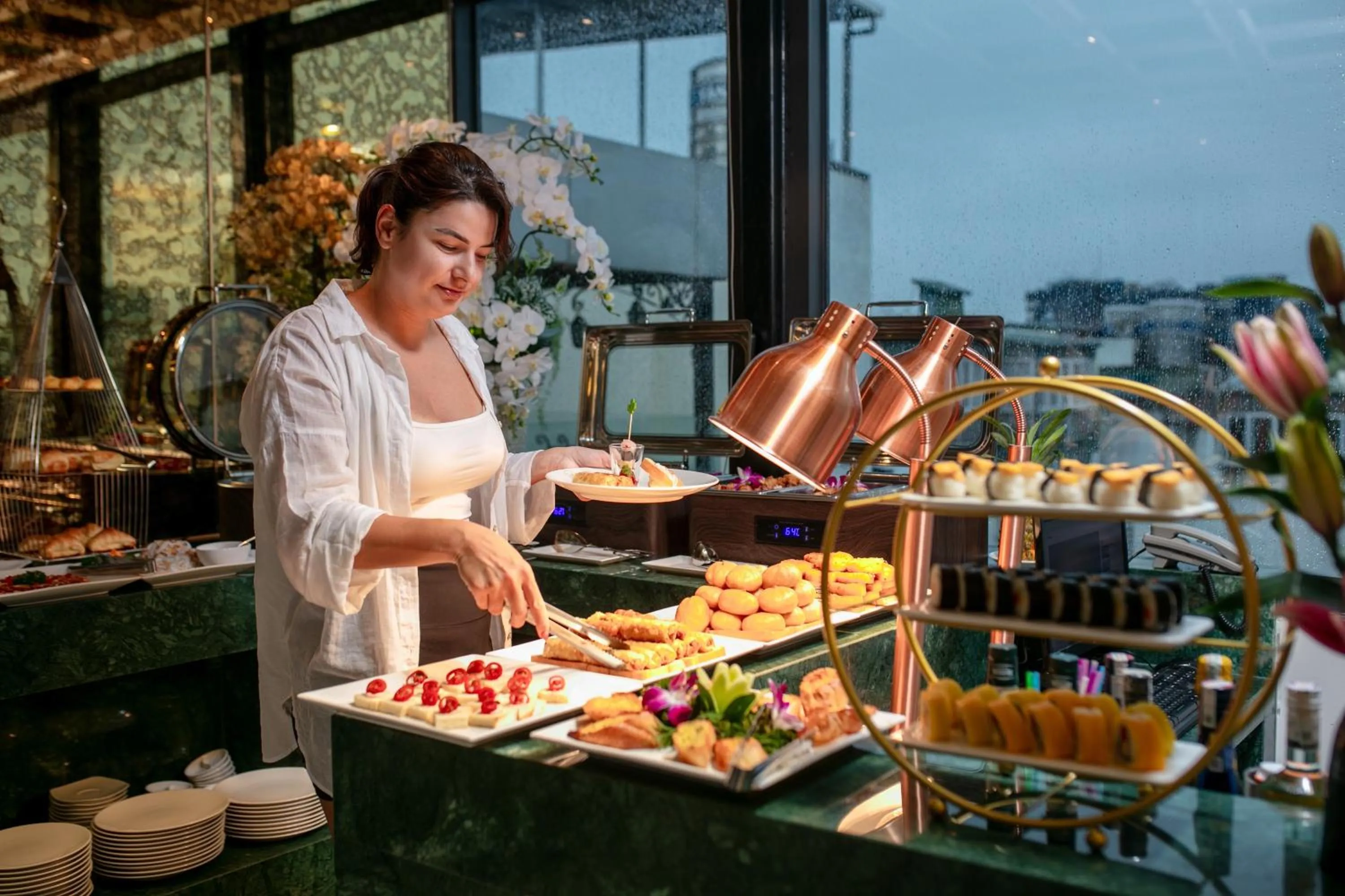 People in Le Premier Hotel & Rooftop Bar