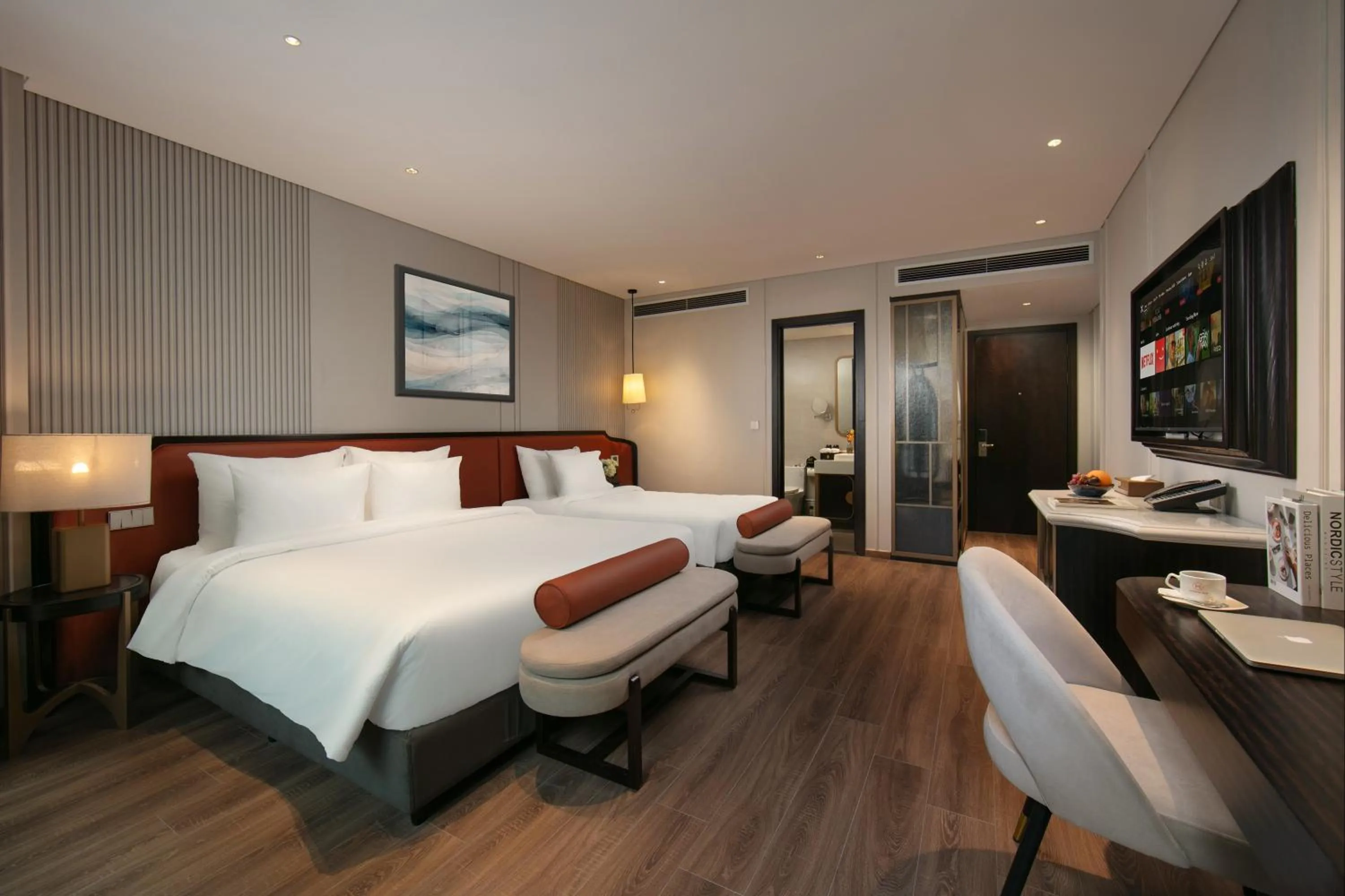 Bed in Le Premier Hotel & Rooftop Bar