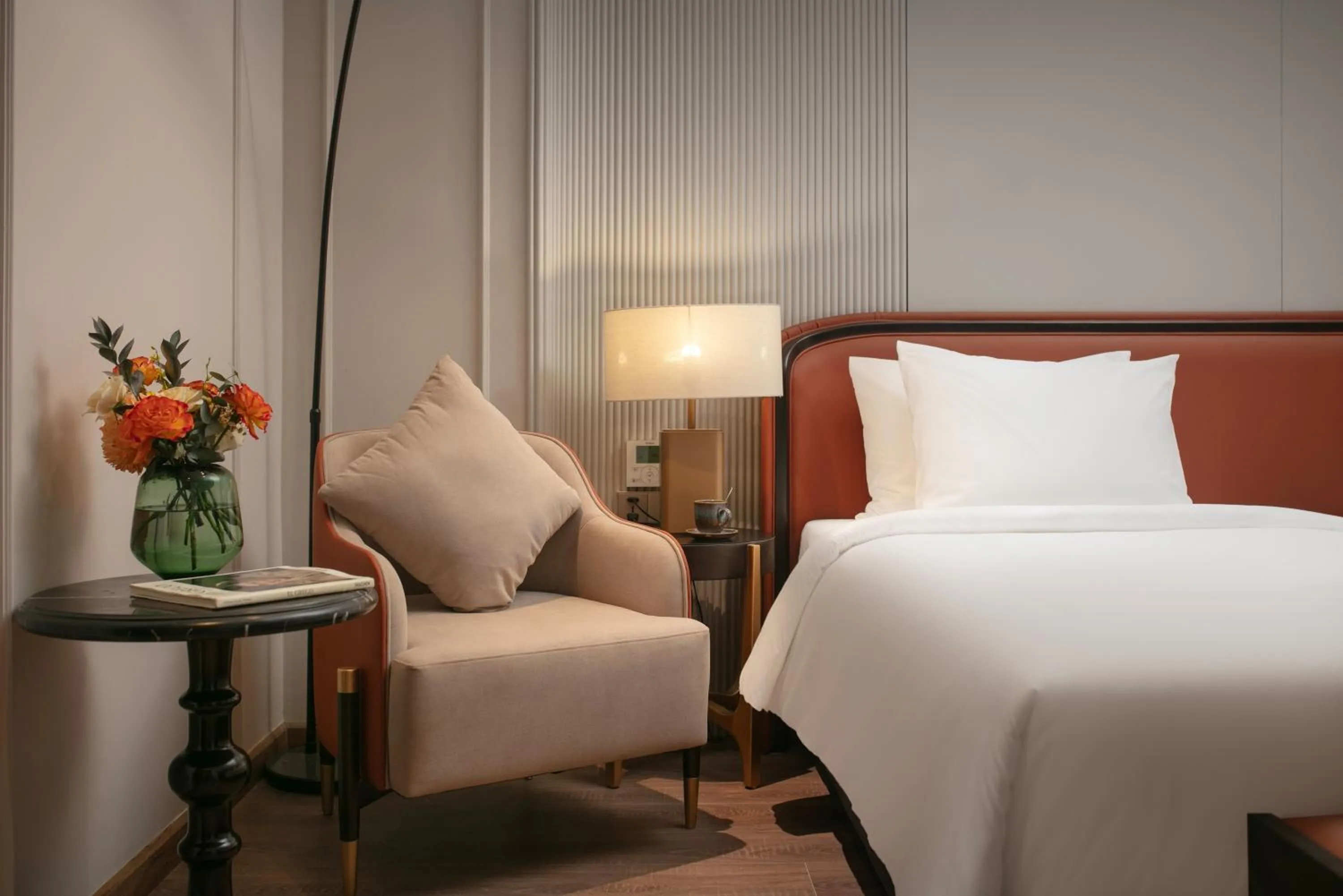 Bed in Le Premier Hotel & Rooftop Bar