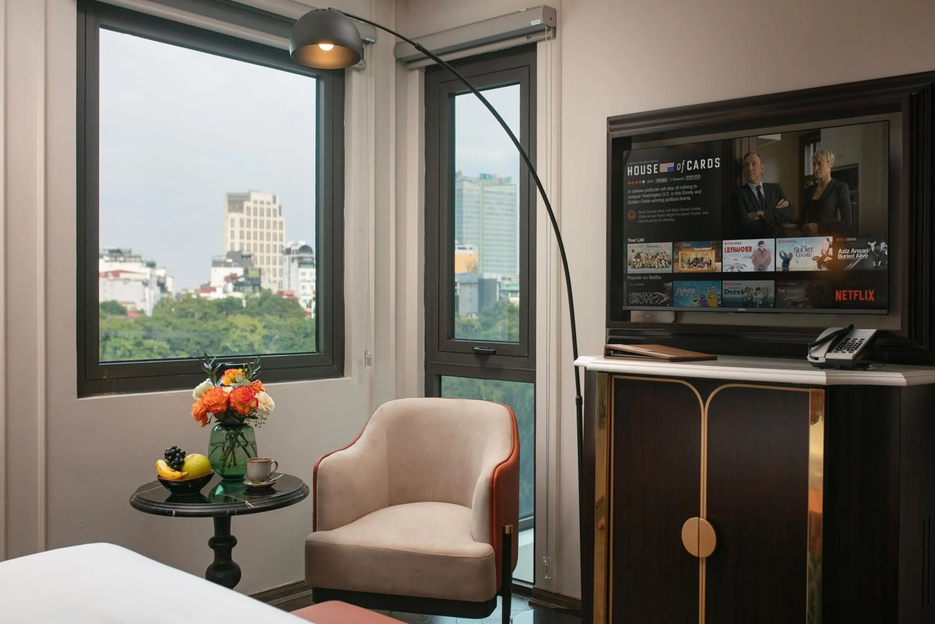 TV and multimedia in Le Premier Hotel & Rooftop Bar