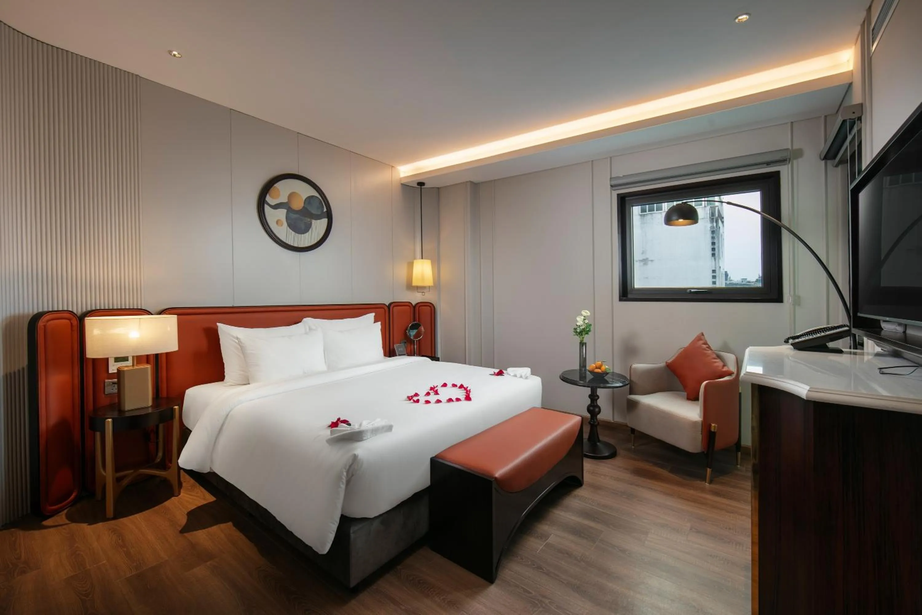 Bed in Le Premier Hotel & Rooftop Bar