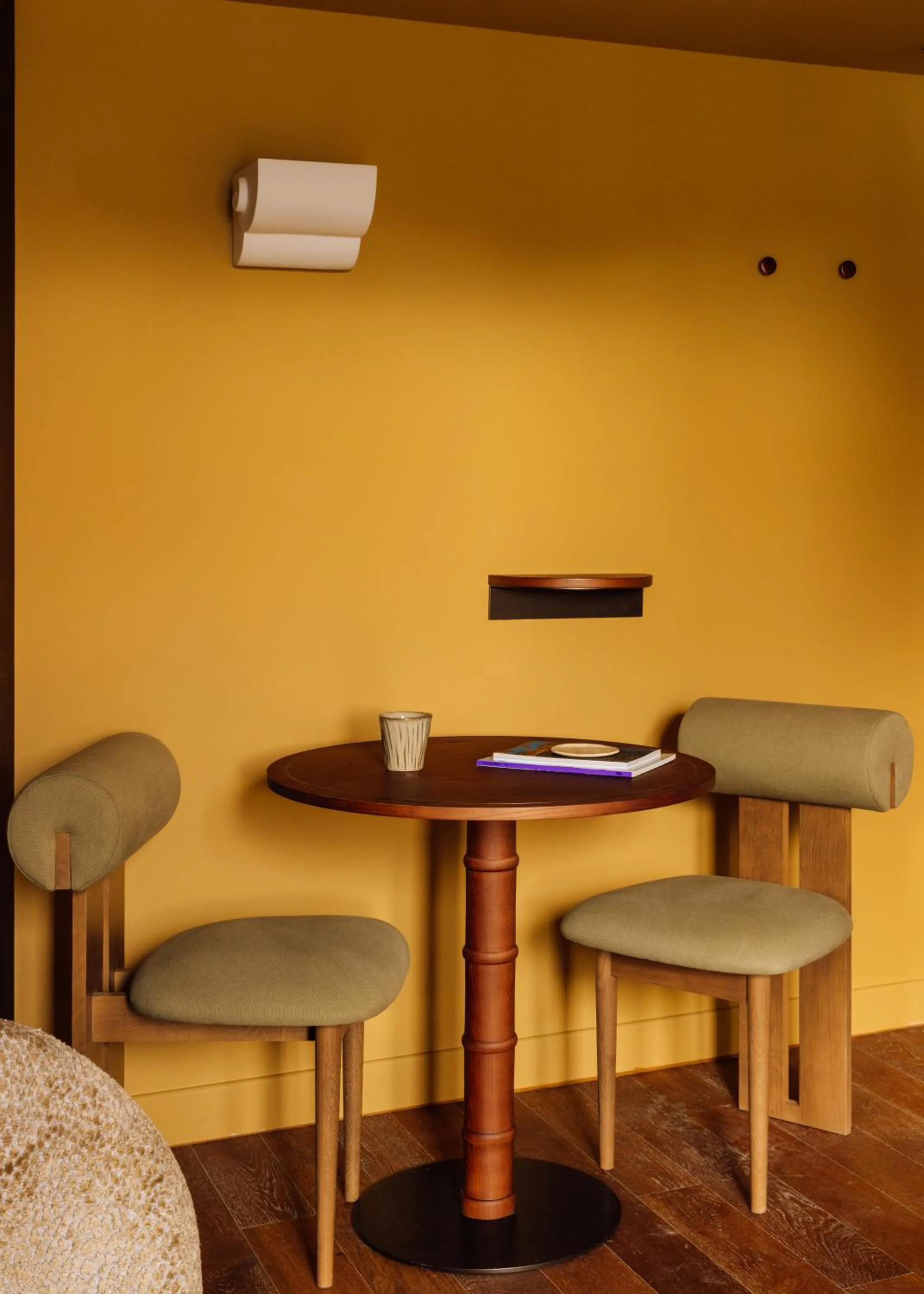 Dining area in Le Jardin de Verre by Locke