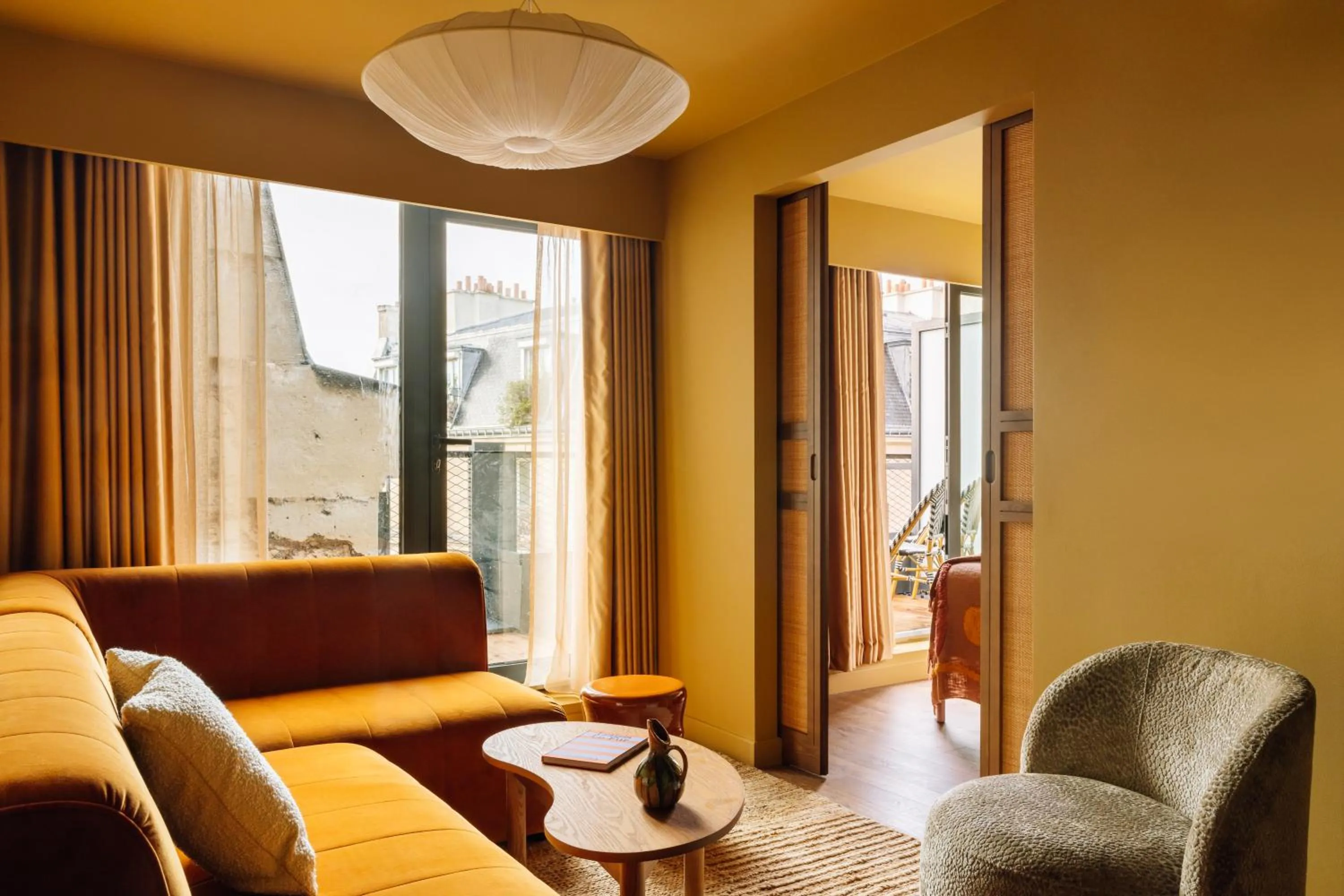 Living room in Le Jardin de Verre by Locke