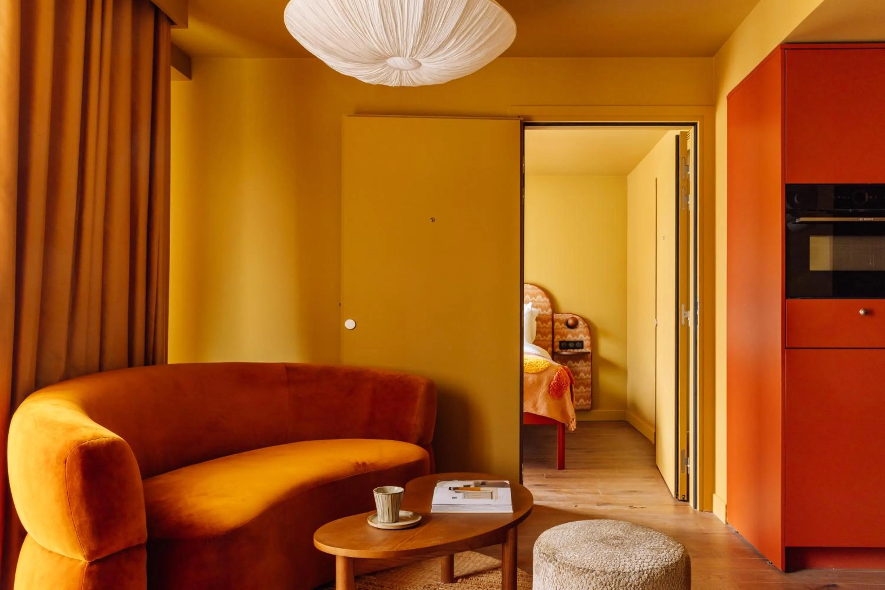 Living room in Le Jardin de Verre by Locke