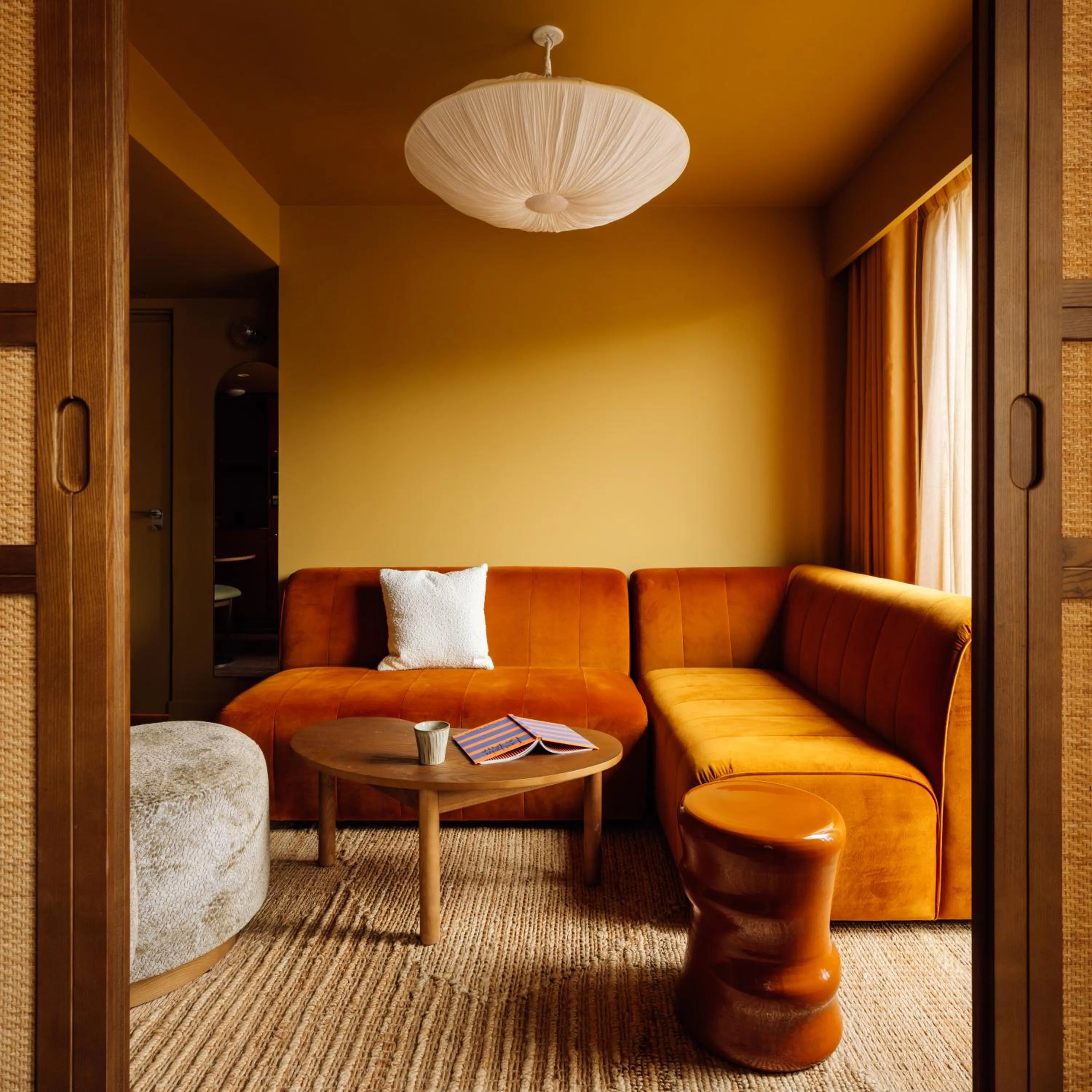 Living room in Le Jardin de Verre by Locke