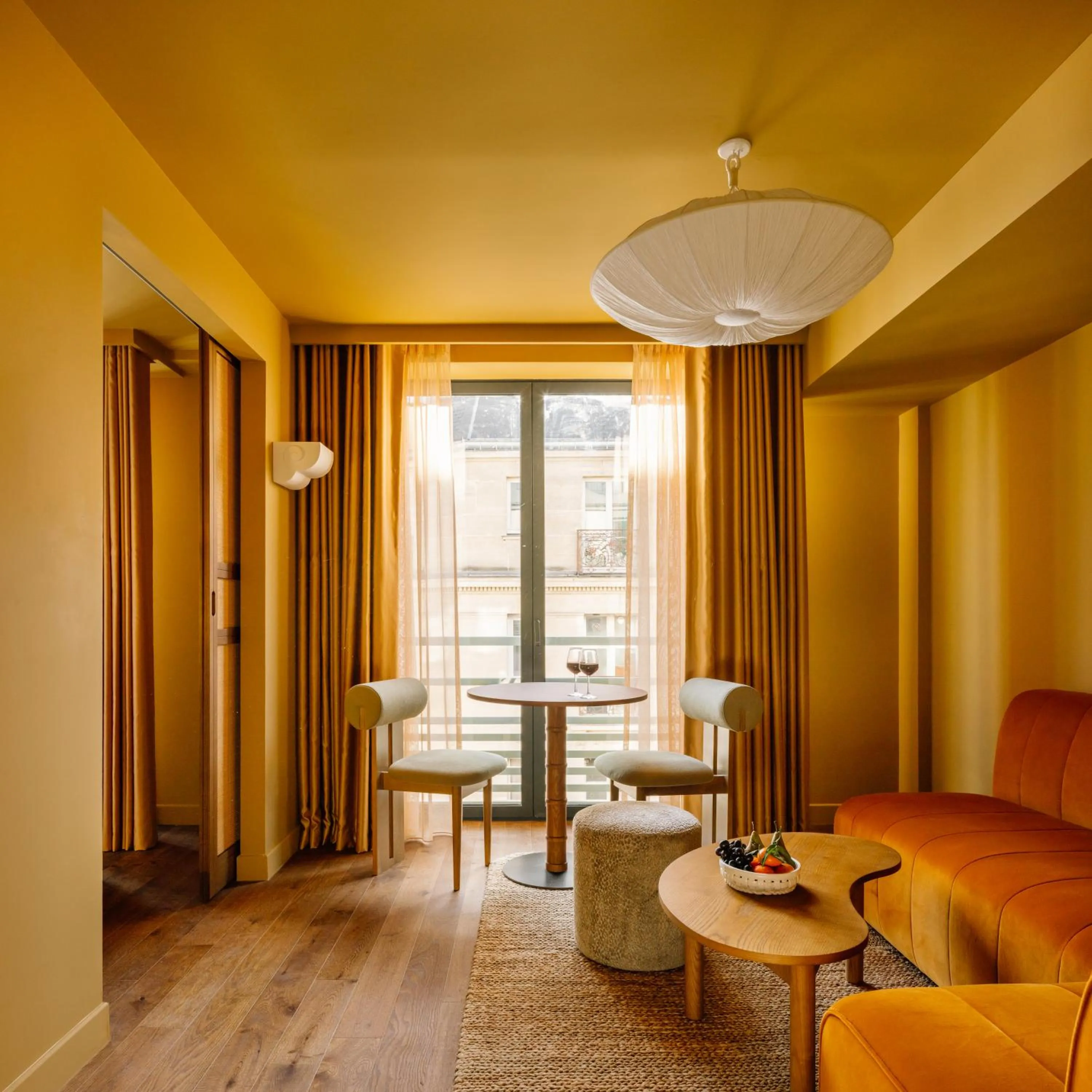 Living room in Le Jardin de Verre by Locke