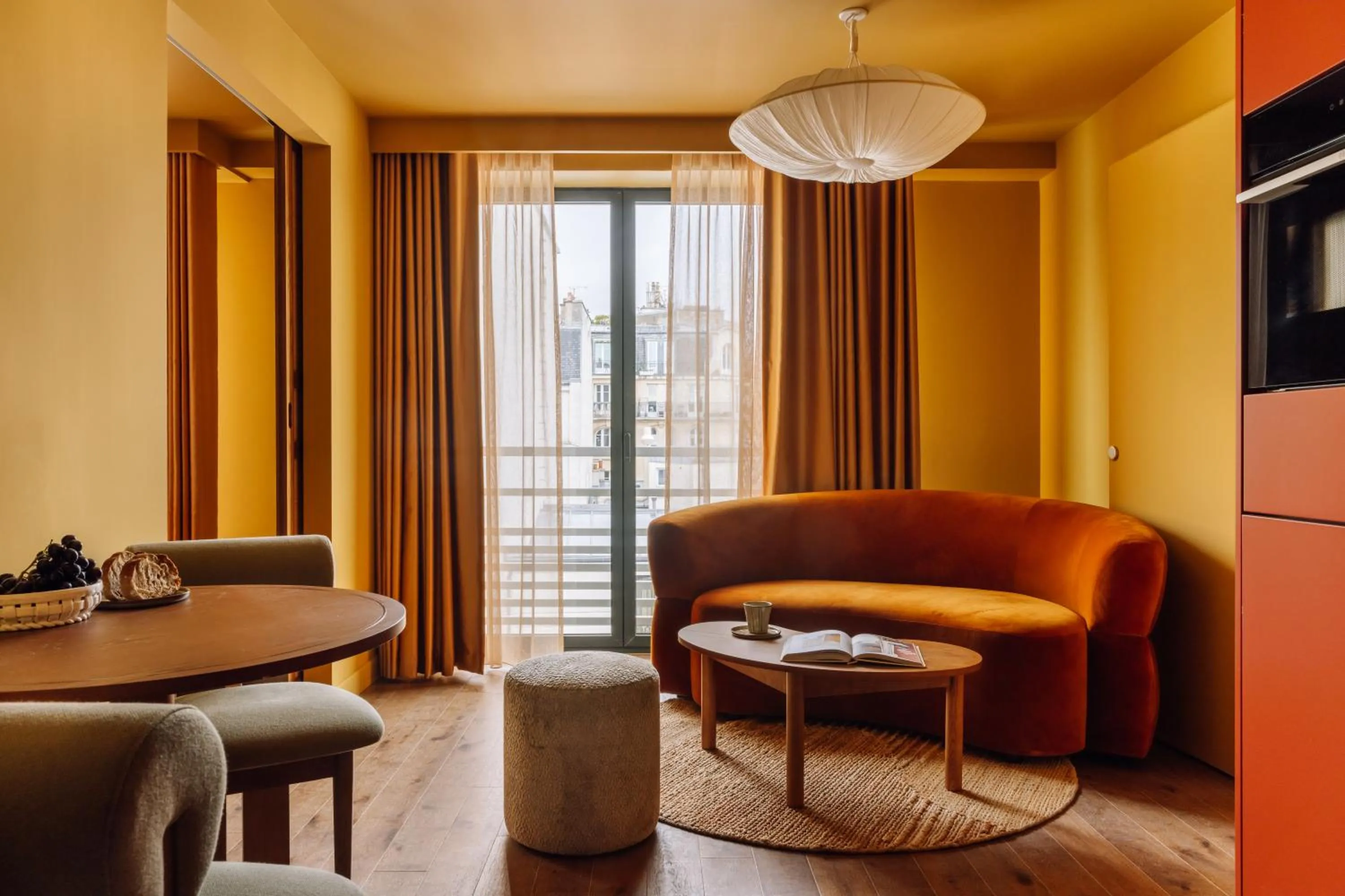 Living room in Le Jardin de Verre by Locke
