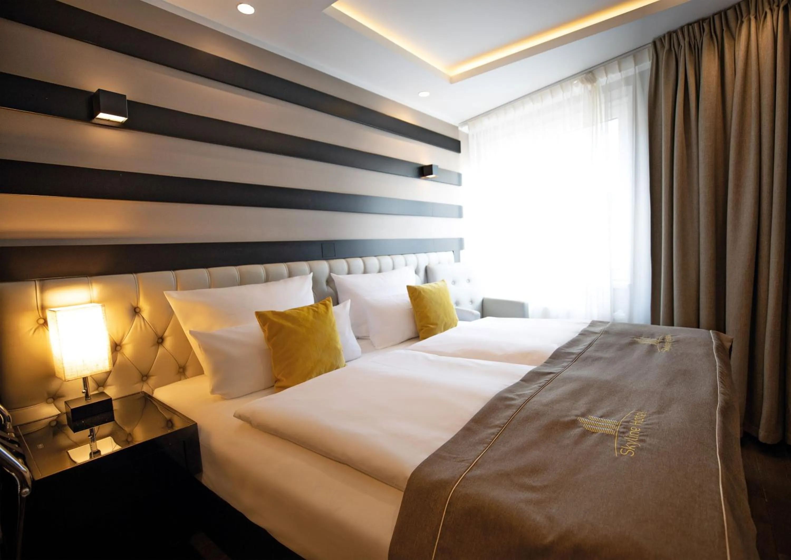 Bed in Skyline Hotel City Frankfurt