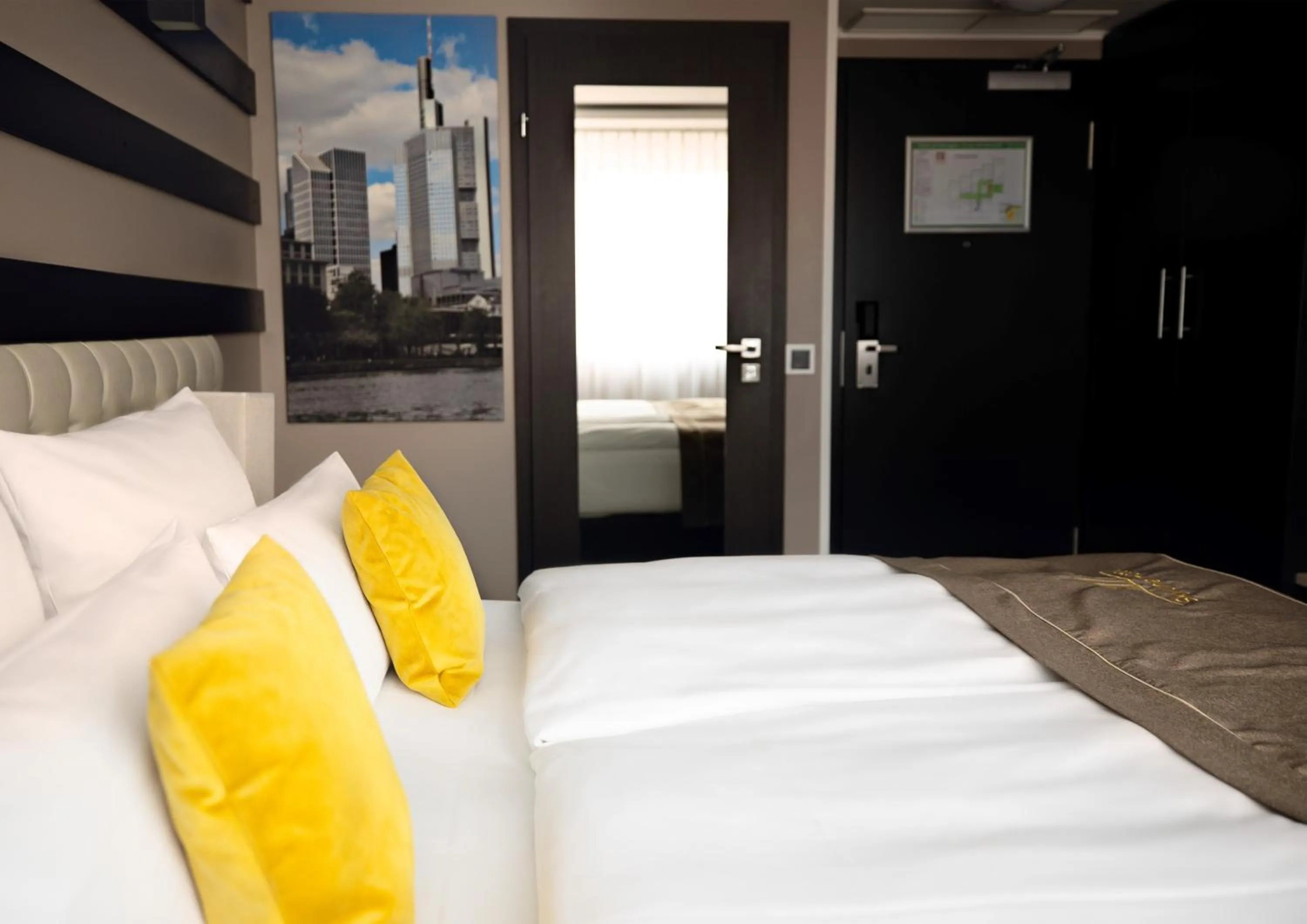 Bed in Skyline Hotel City Frankfurt