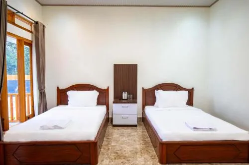 Bed in Zoya Rinjani Villa