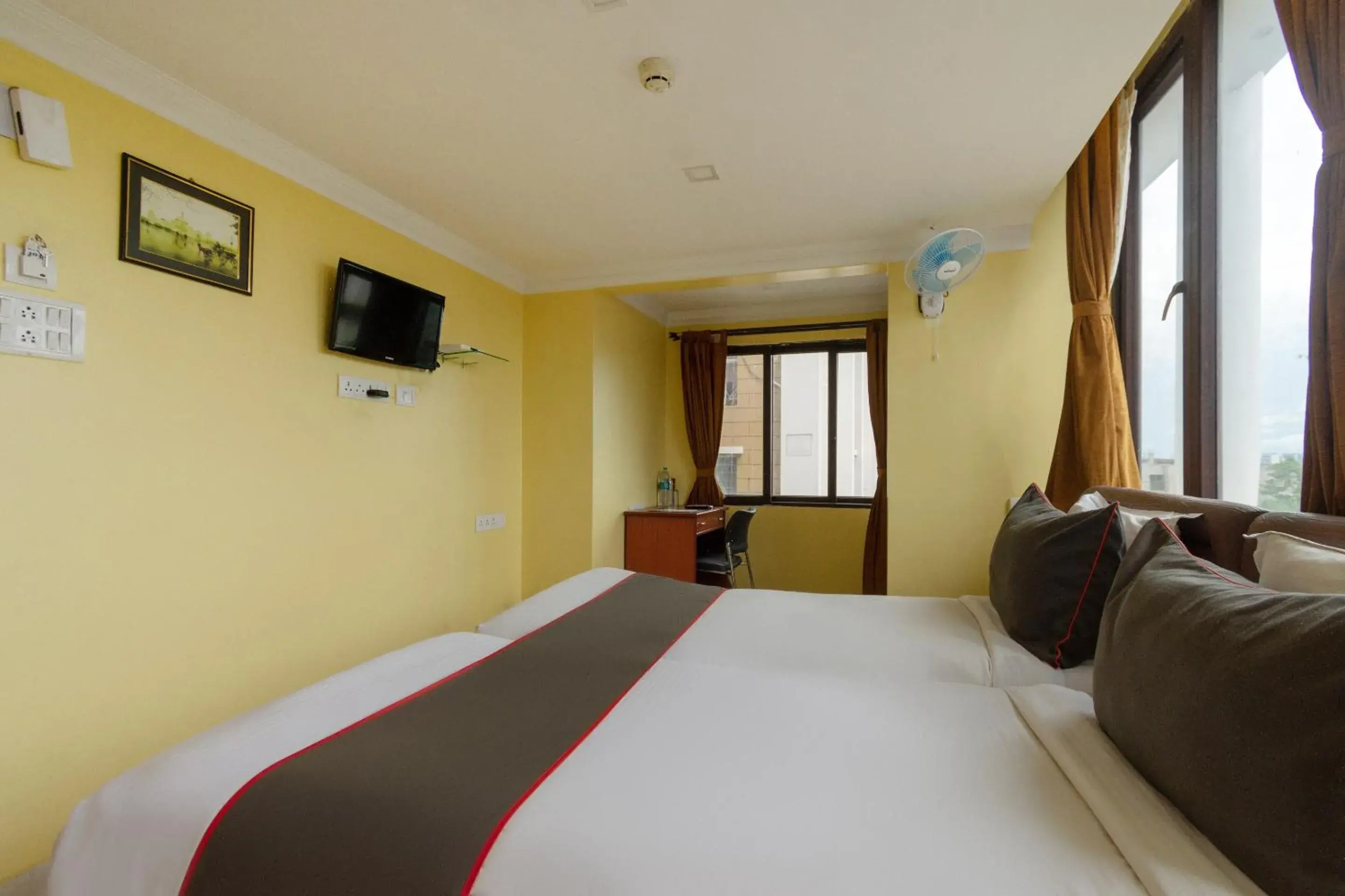 Bedroom in Collection O Raj Darbar Near City Centre Bedroom in Collection O Raj Darbar Near City Centre