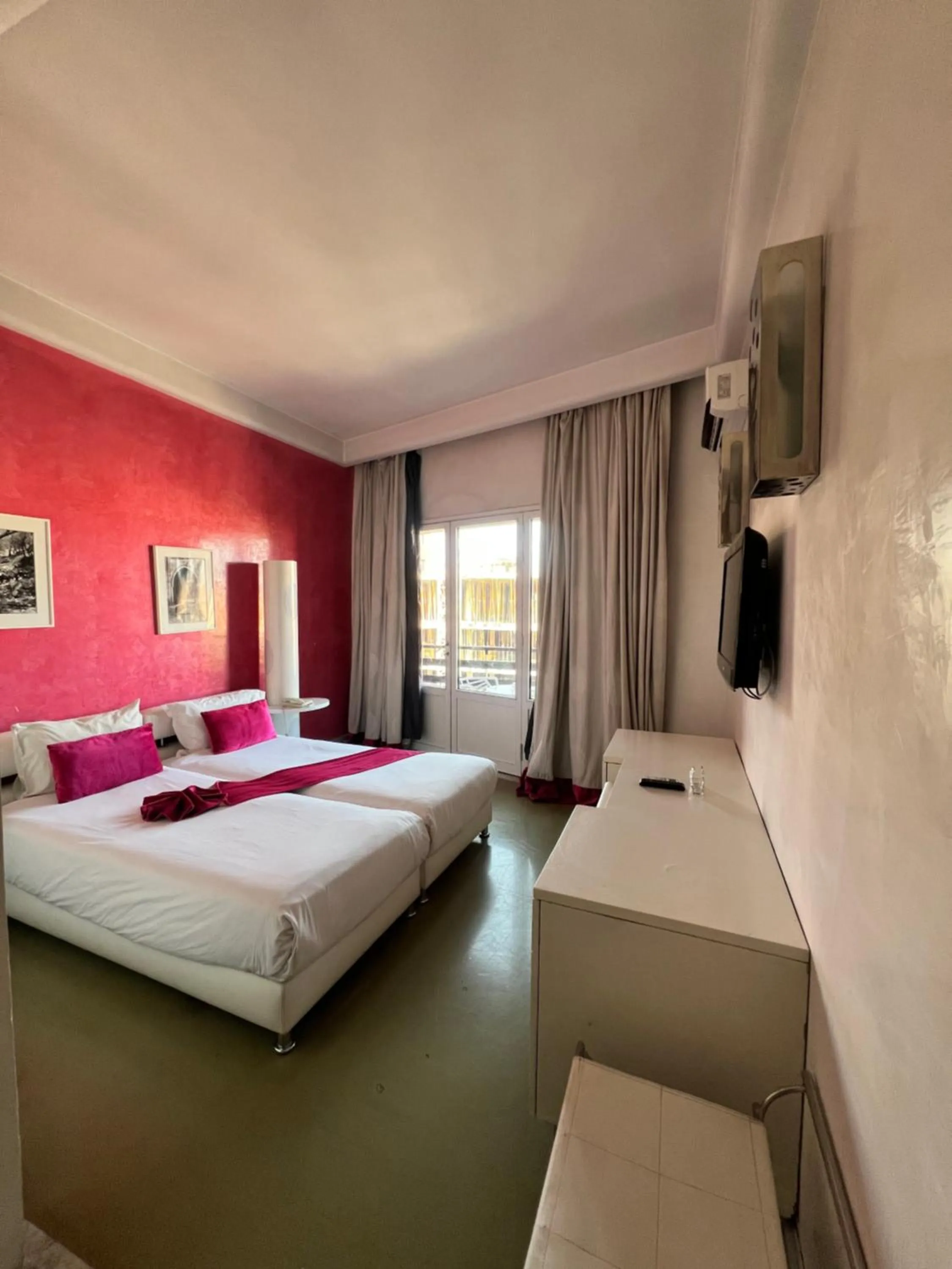 Bed in La Renaissance hôtel Marrakech