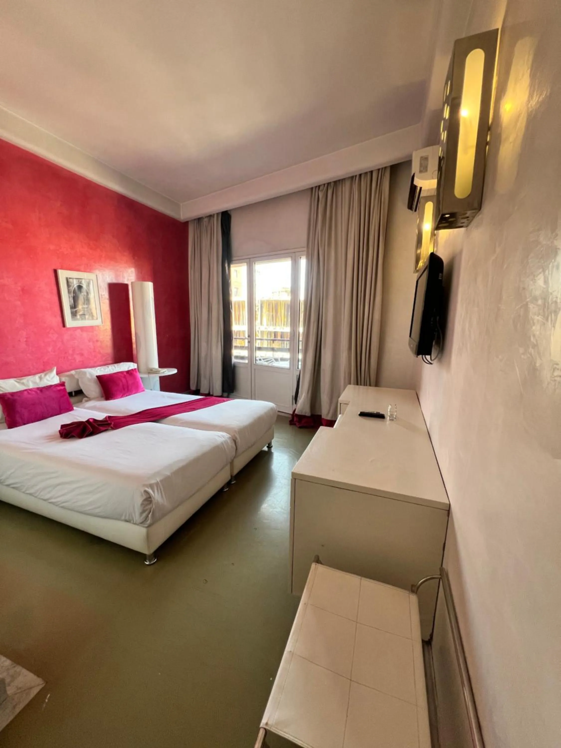 Bed in La Renaissance hôtel Marrakech