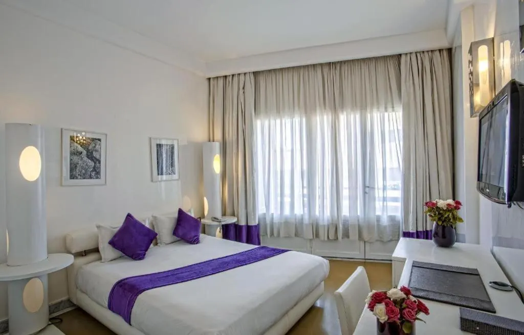 Bed in La Renaissance hôtel Marrakech