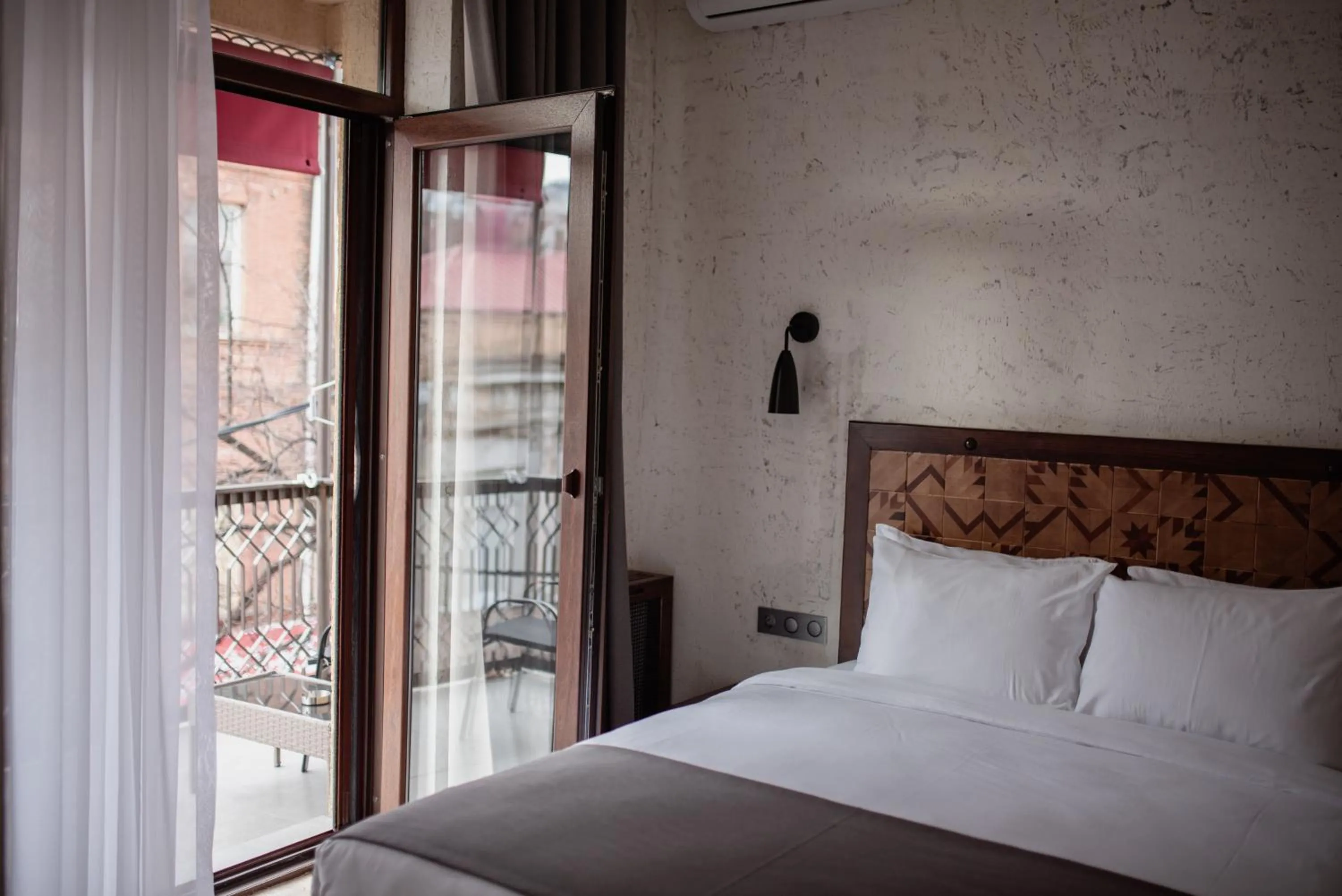 Bed in Kazma Boutique Hotel