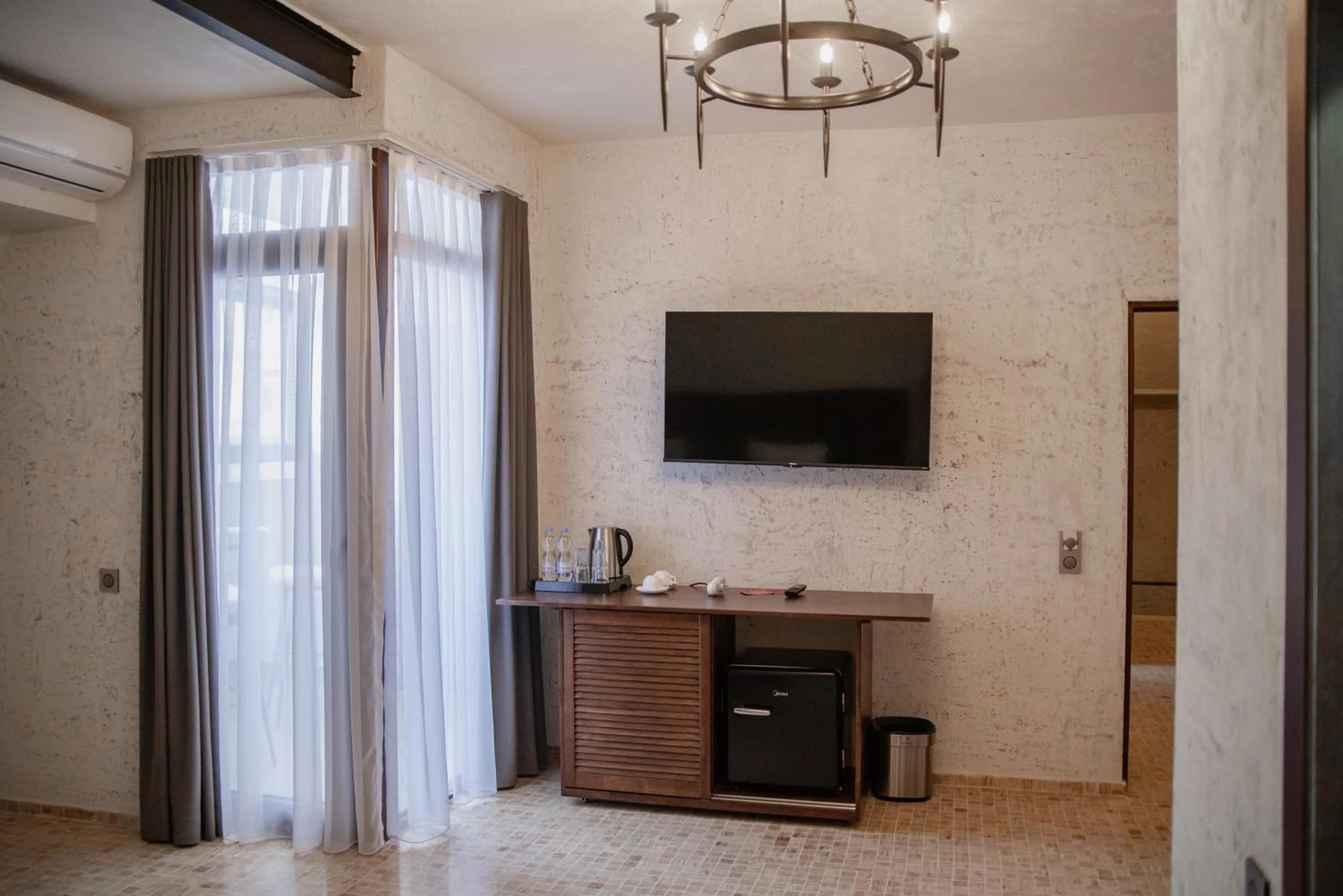 TV and multimedia in Kazma Boutique Hotel