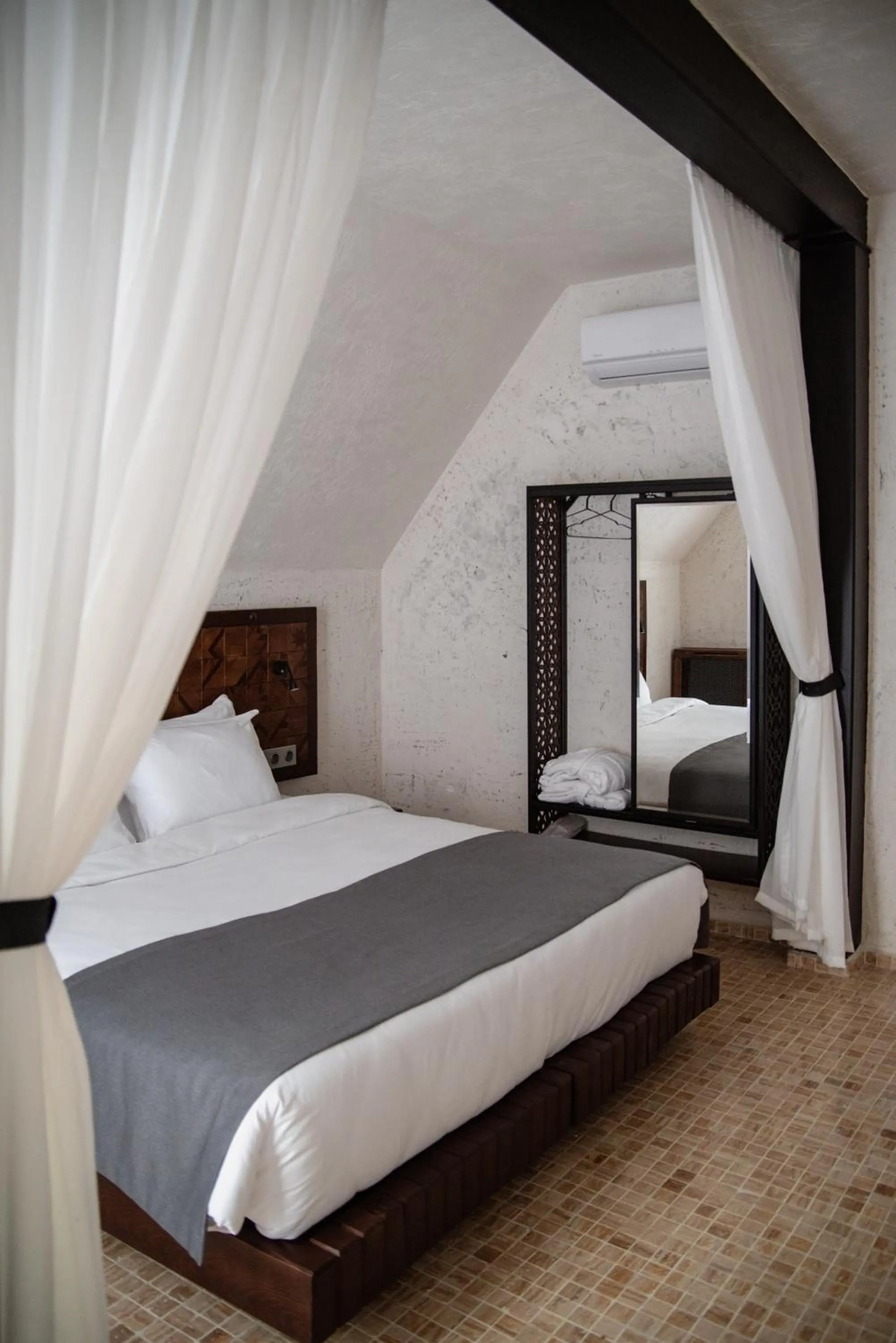 Bed in Kazma Boutique Hotel