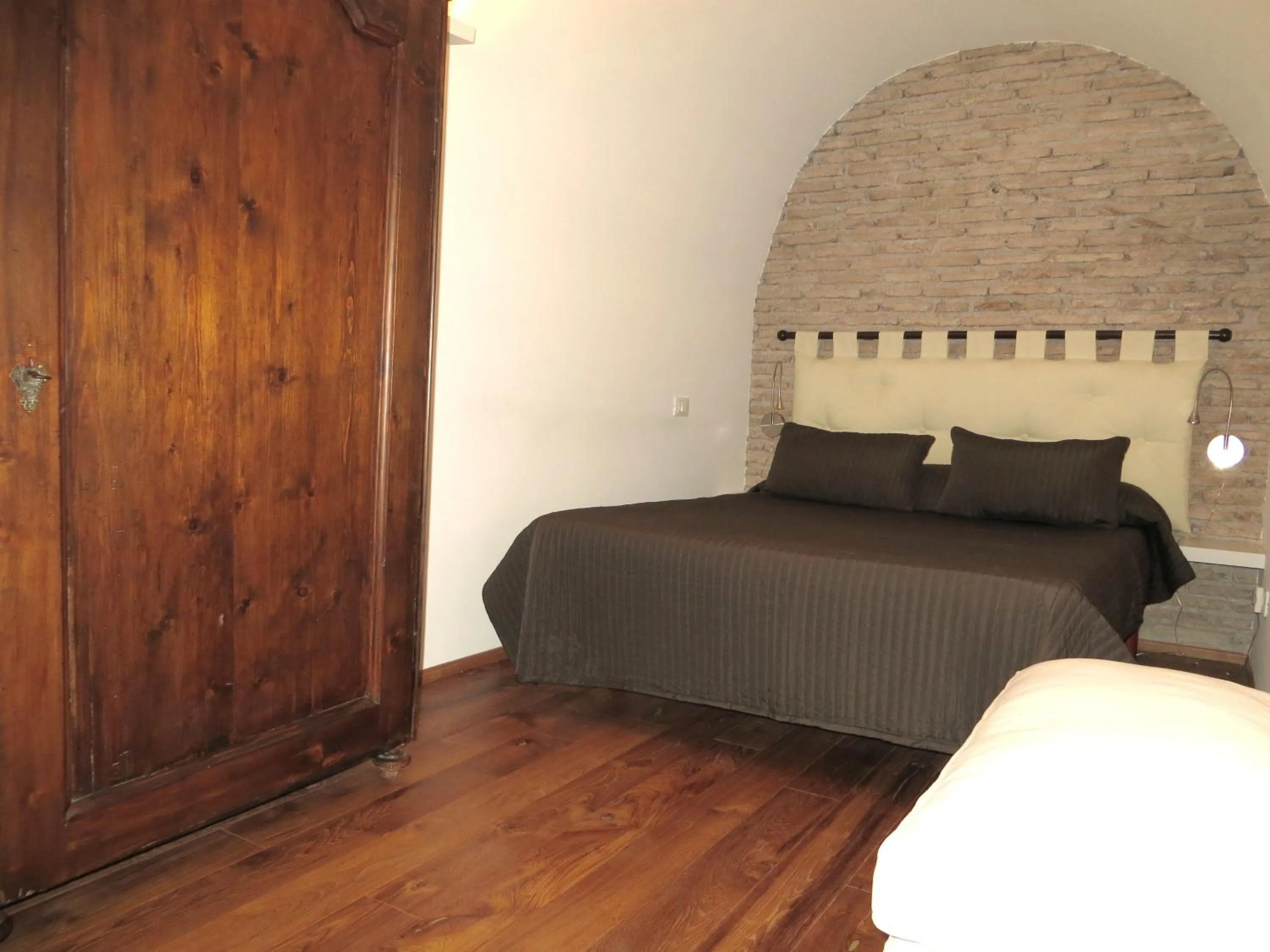 Bed in Appartamento Benincampi