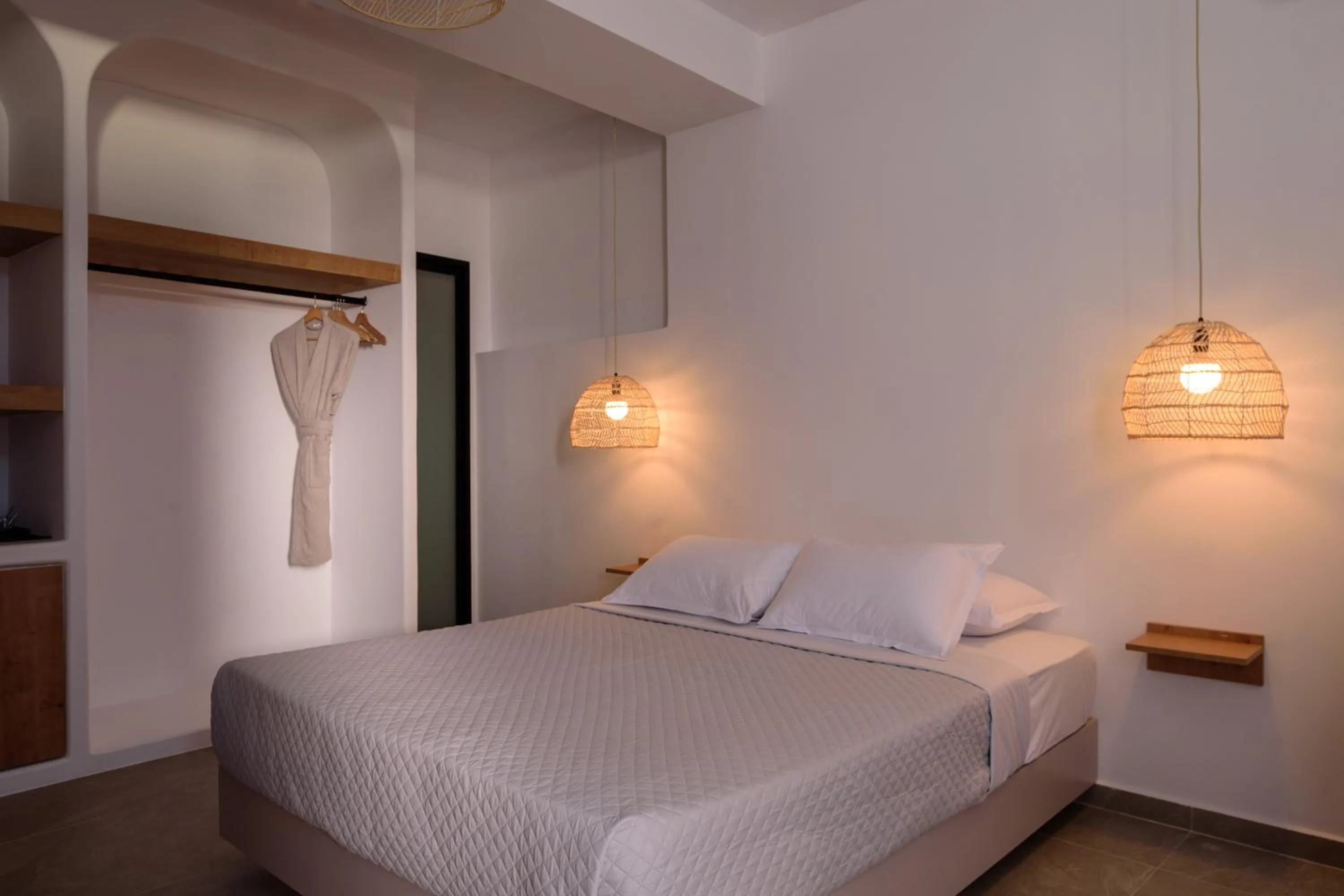 Bed in Elia Caldera Suites