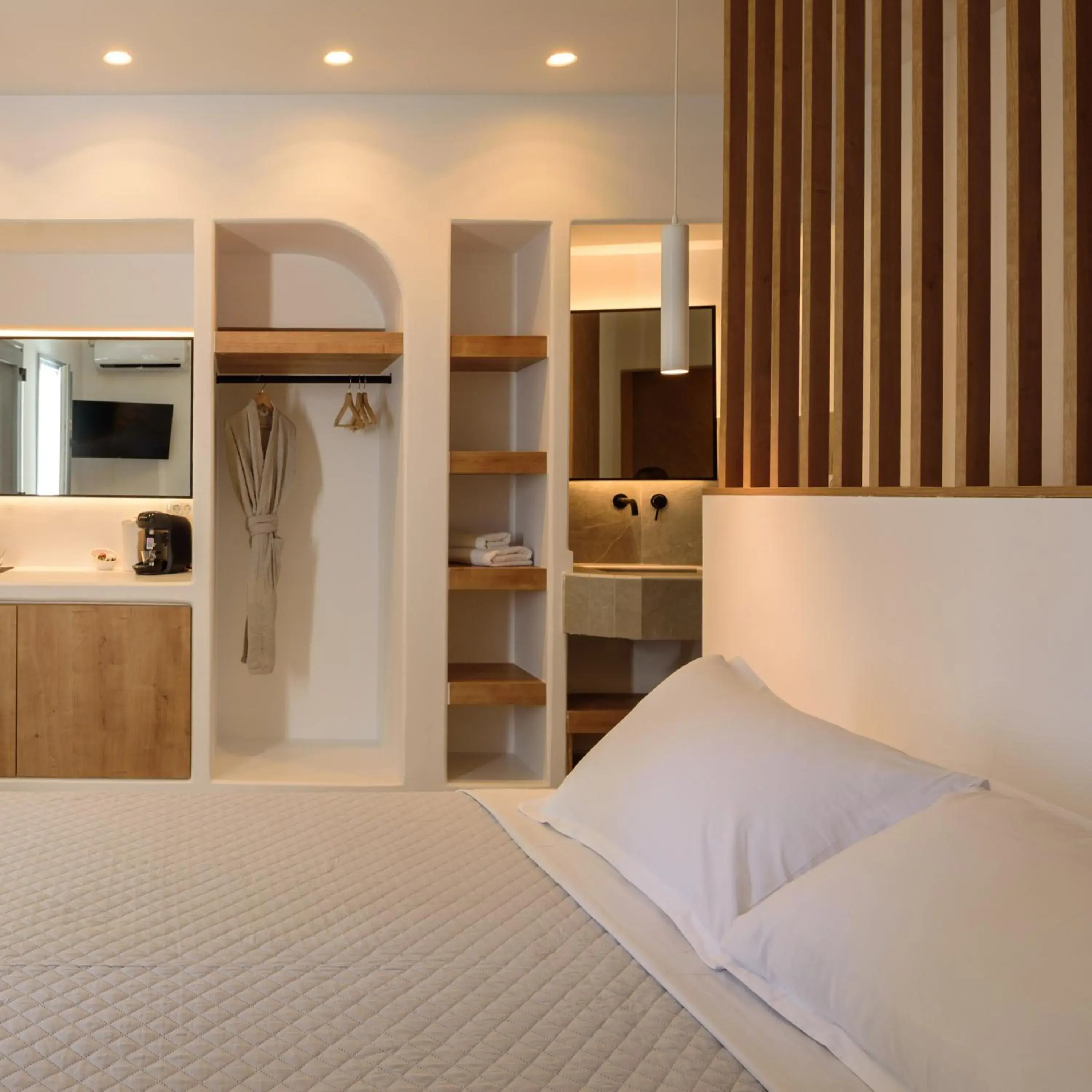 Bed in Elia Caldera Suites Bed in Elia Caldera Suites