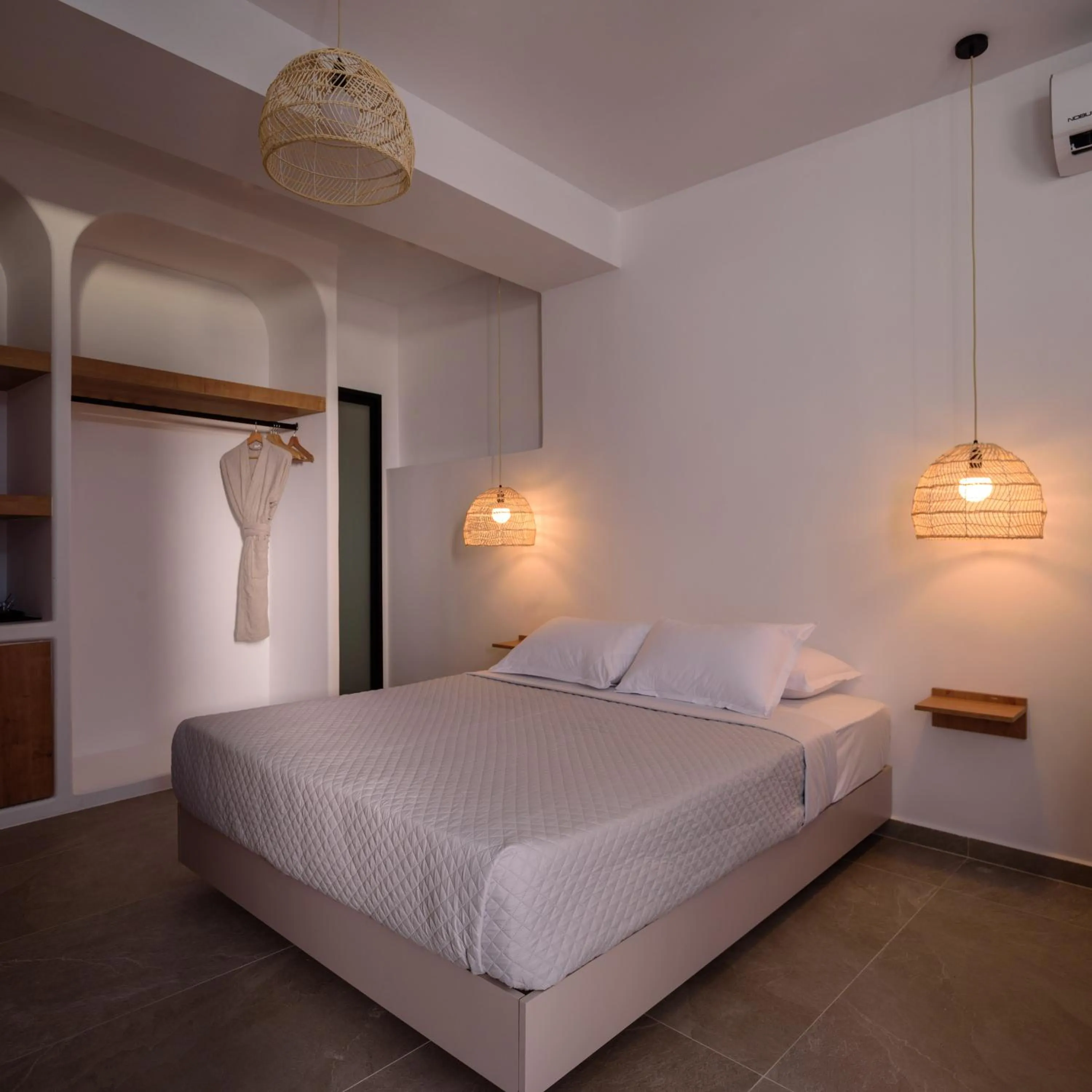 Bed in Elia Caldera Suites
