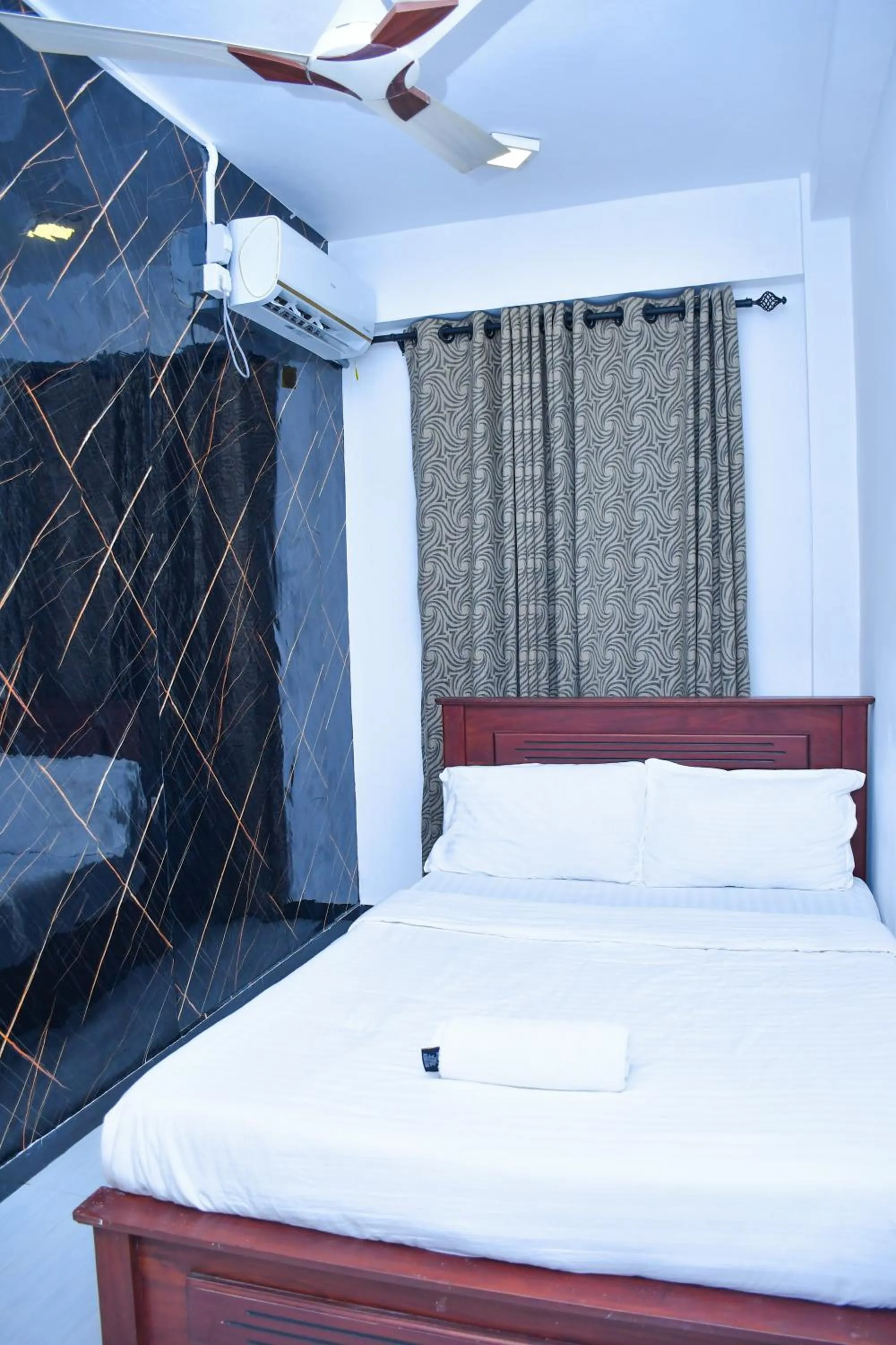 Bed in Ez Stay Guesthouse