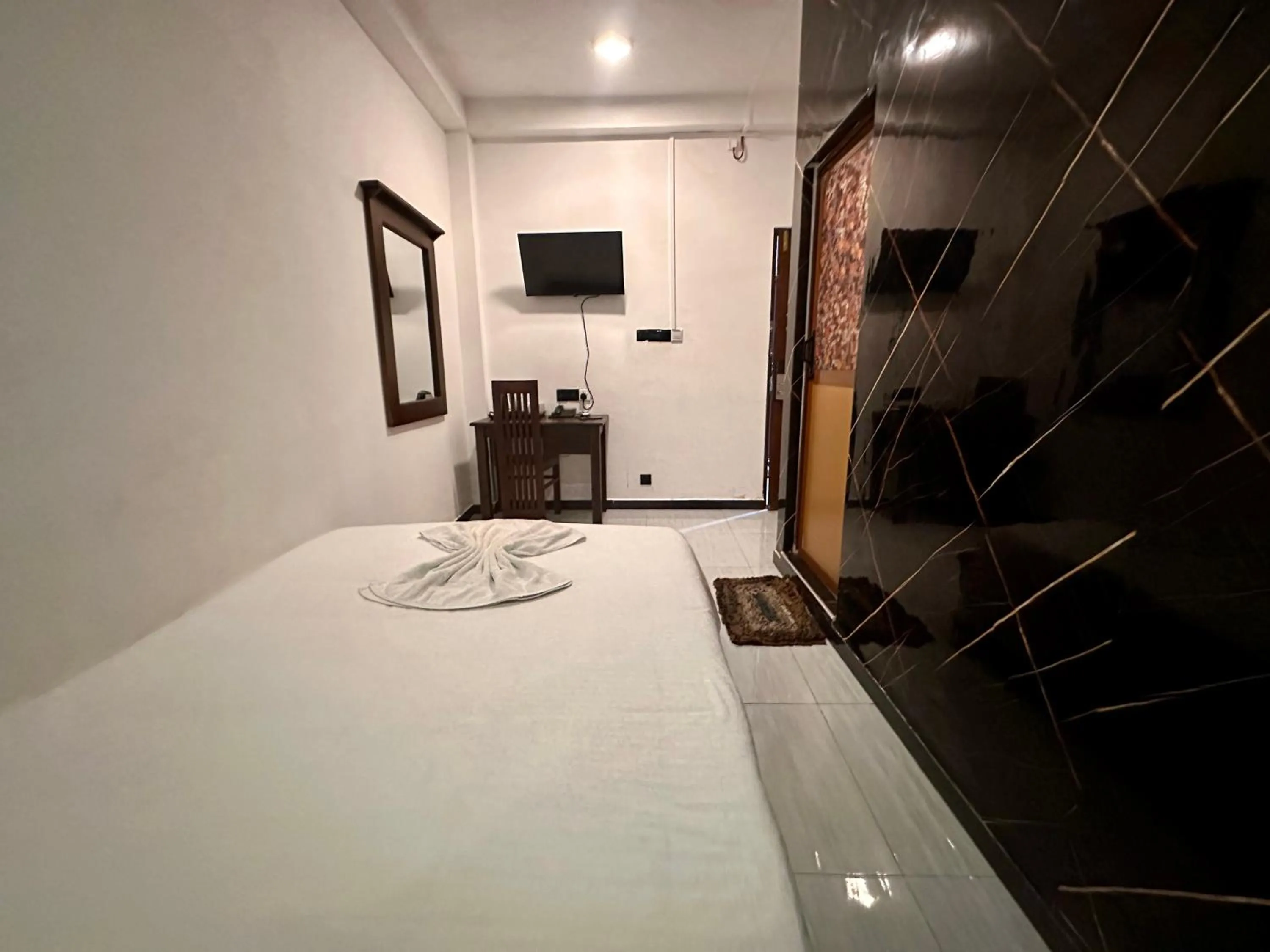 Bed in Ez Stay Guesthouse