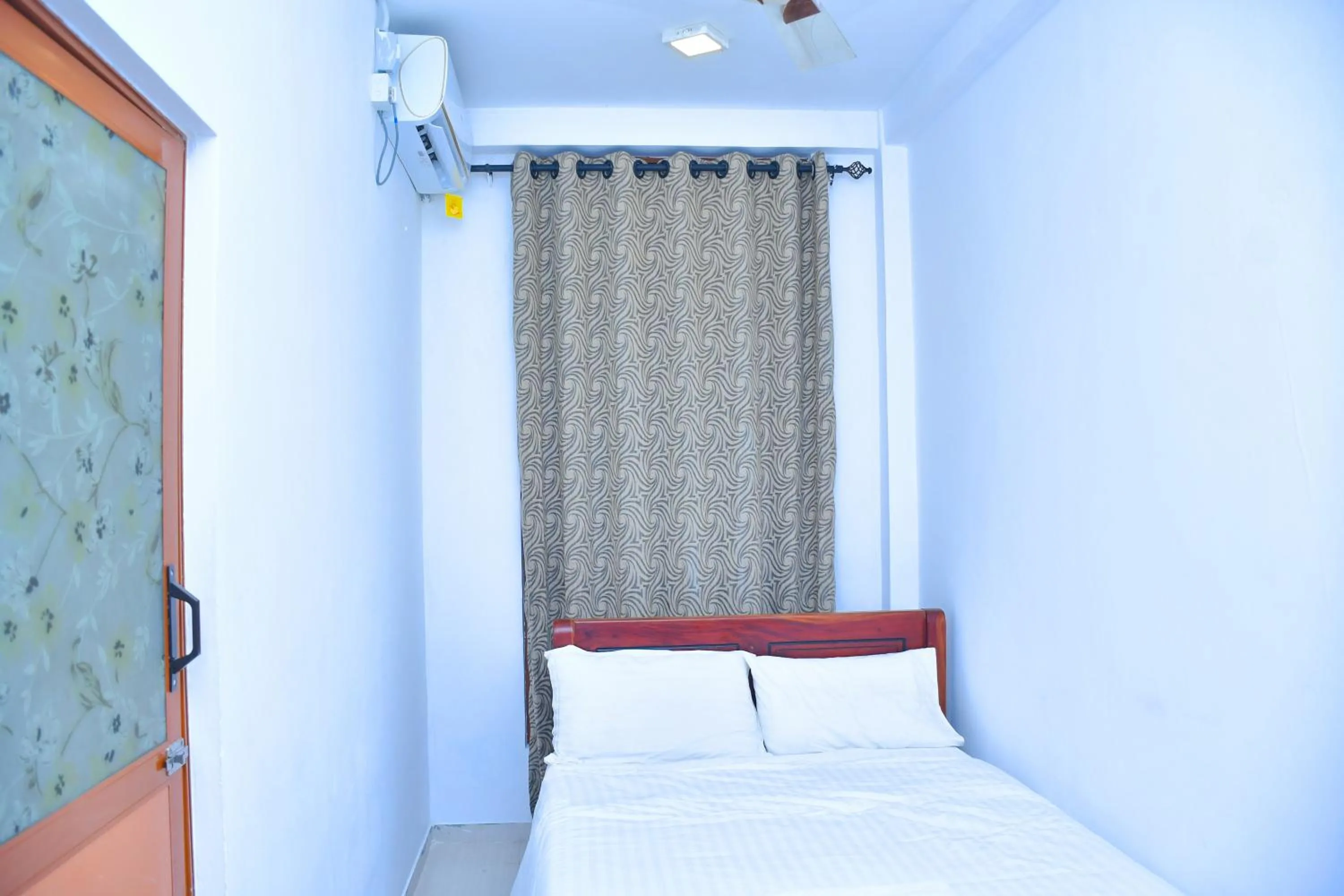 Bed in Ez Stay Guesthouse