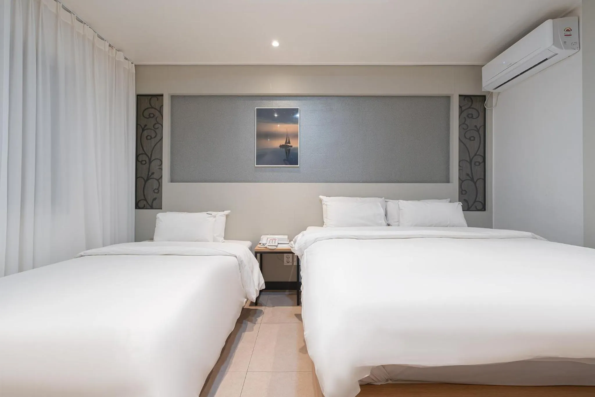 Bed in Curve Hotel Iksan