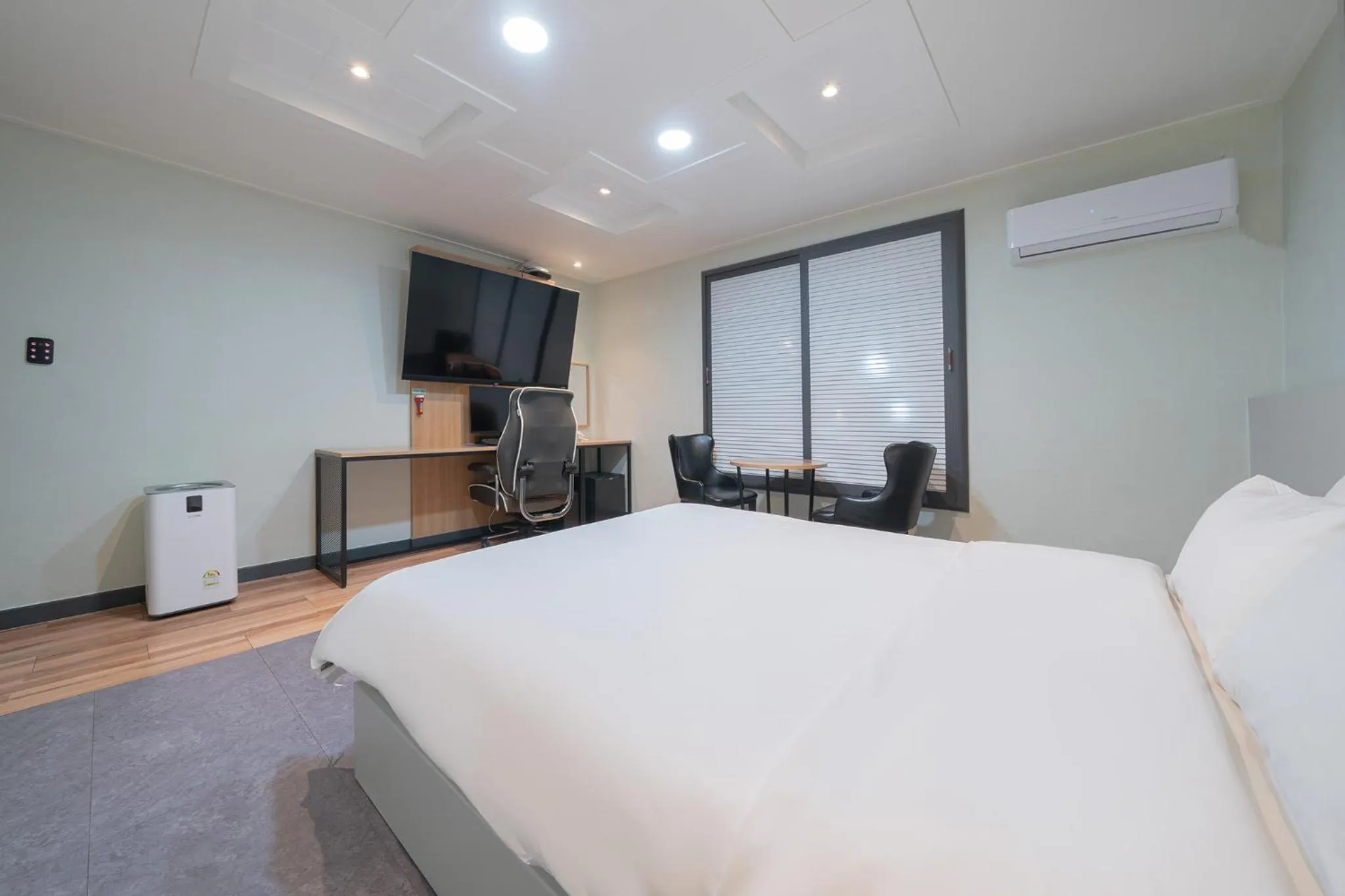 Bed in Curve Hotel Iksan