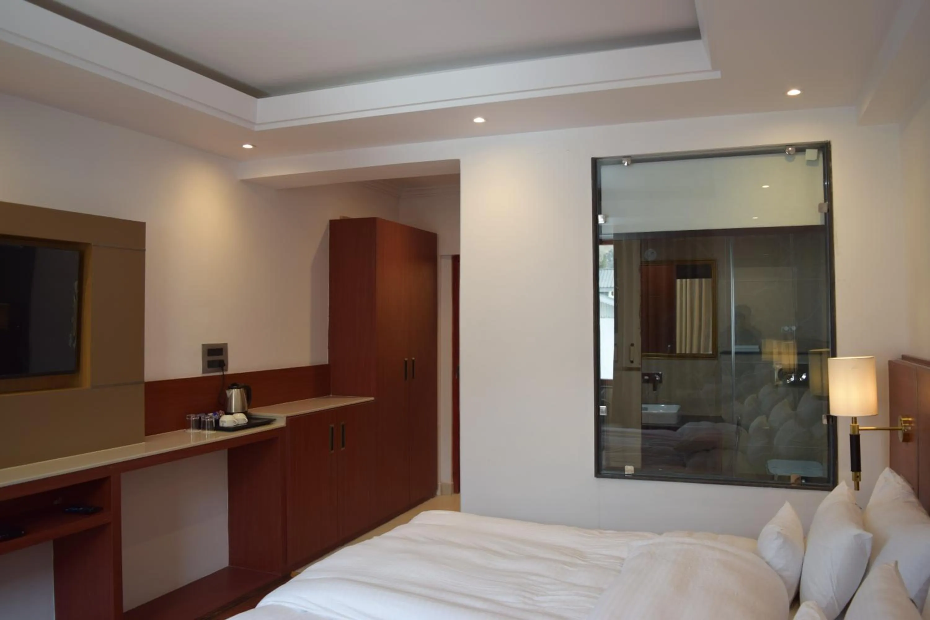 Bed in Hotel The Haven - Centrally Heated and Air Conditioned