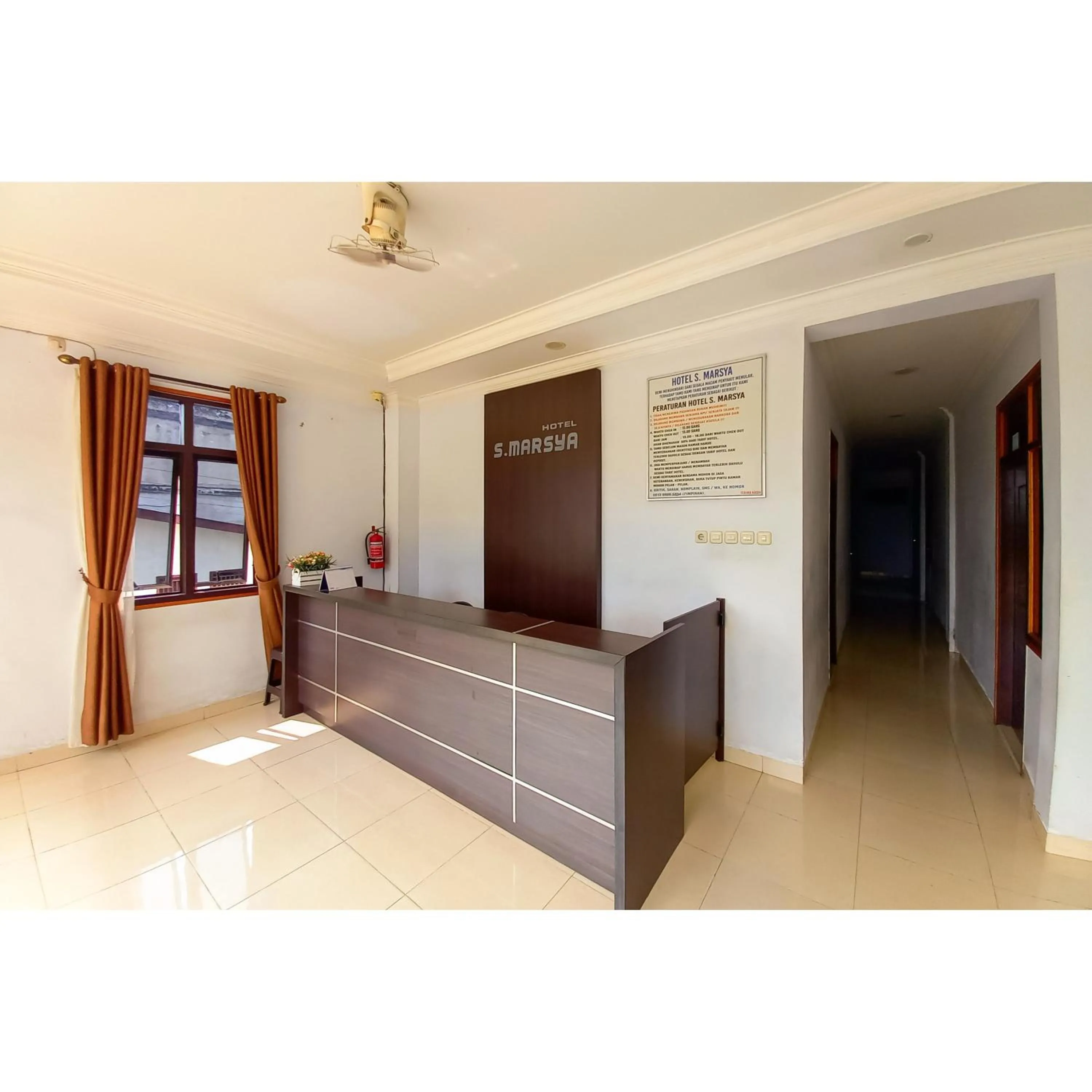 Lobby or reception in RedDoorz Syariah near Universitas Muhammadiyah Bungo