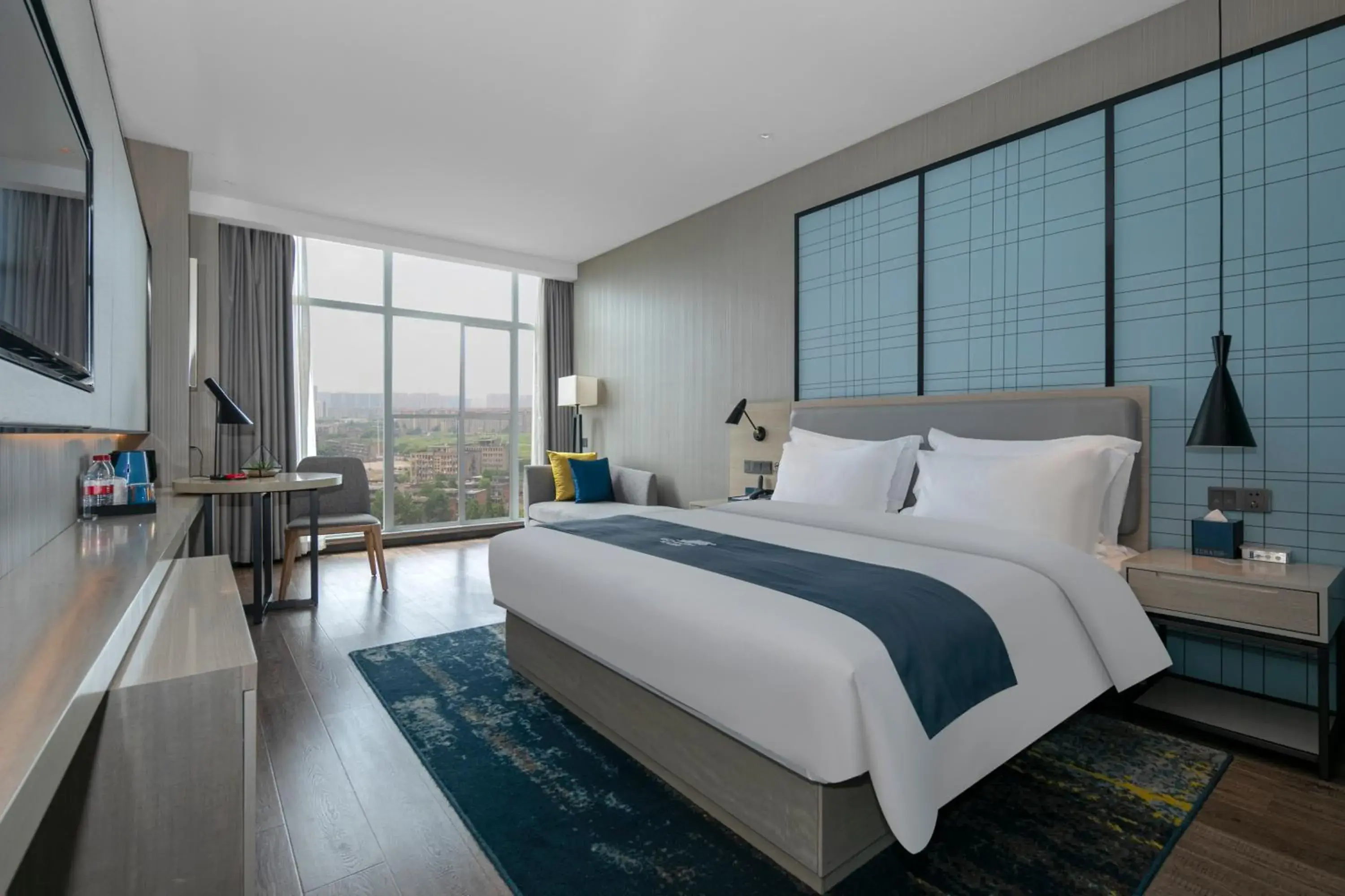 Photo of the whole room, Bed in Eharm Hotel Jingzhou Olympic Sports Center Photo of the whole room, Bed in Eharm Hotel Jingzhou Olympic Sports Center