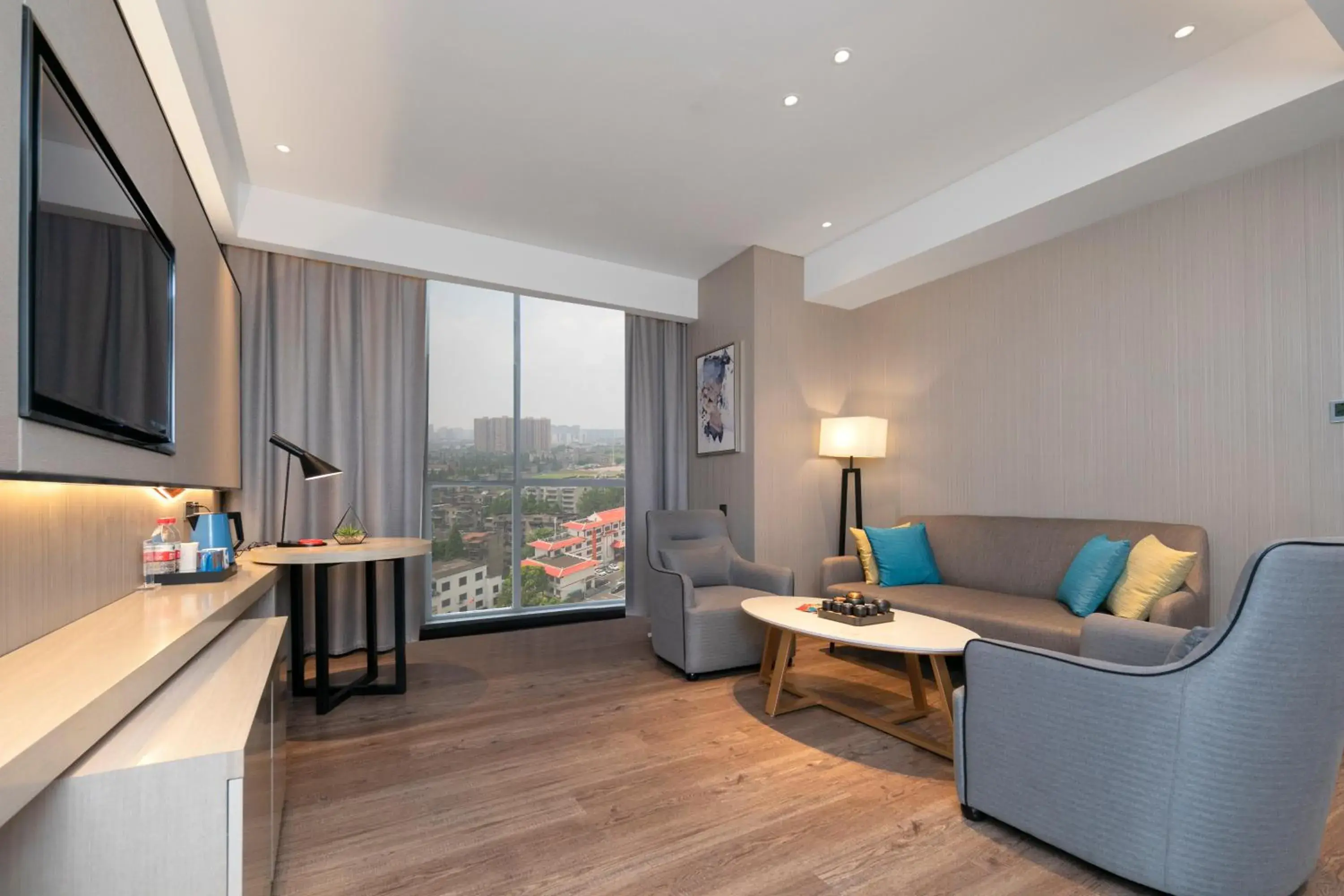 Seating area in Eharm Hotel Jingzhou Olympic Sports Center Seating area in Eharm Hotel Jingzhou Olympic Sports Center