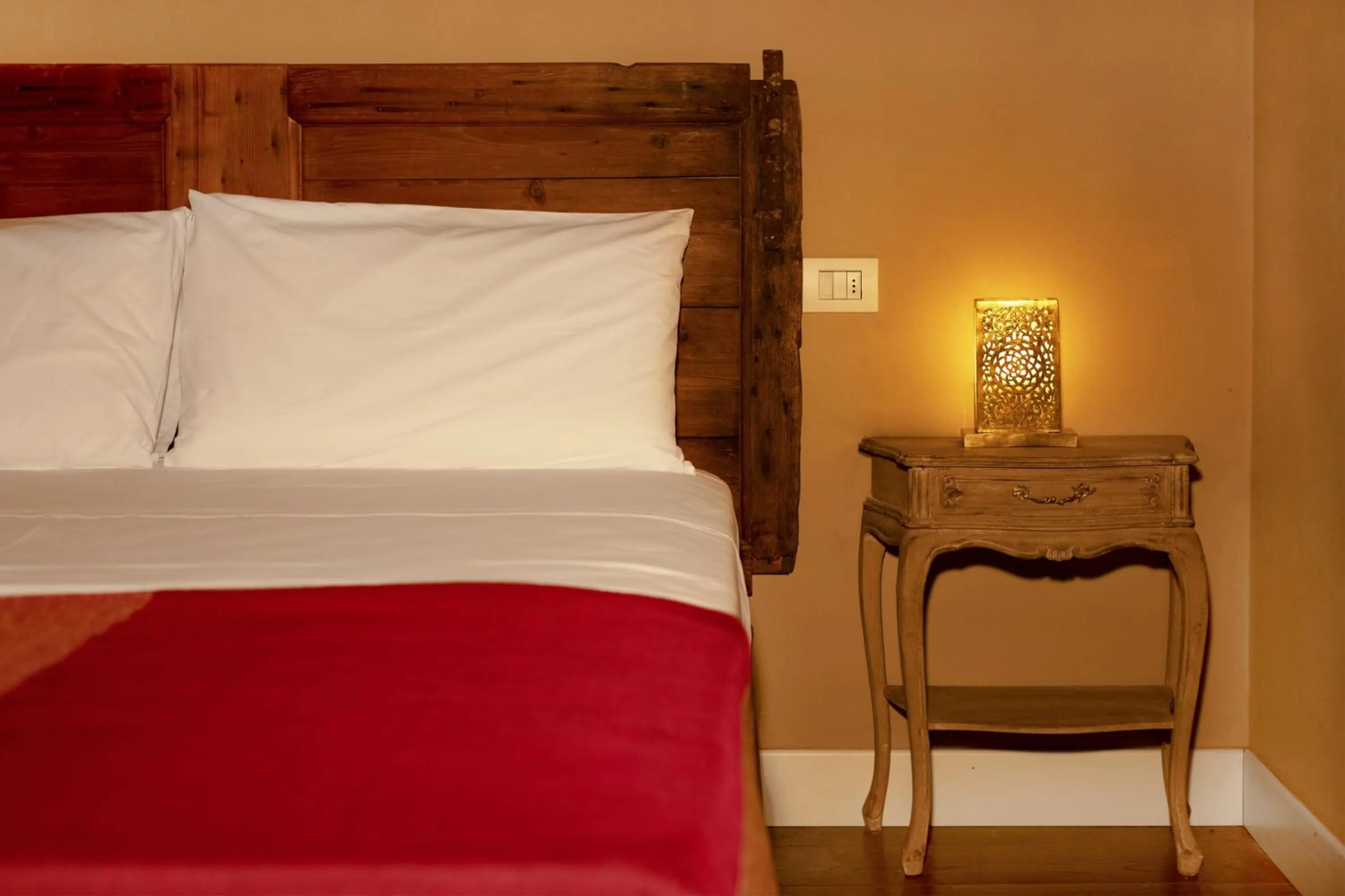 Bed in Luce Boutique Hotel